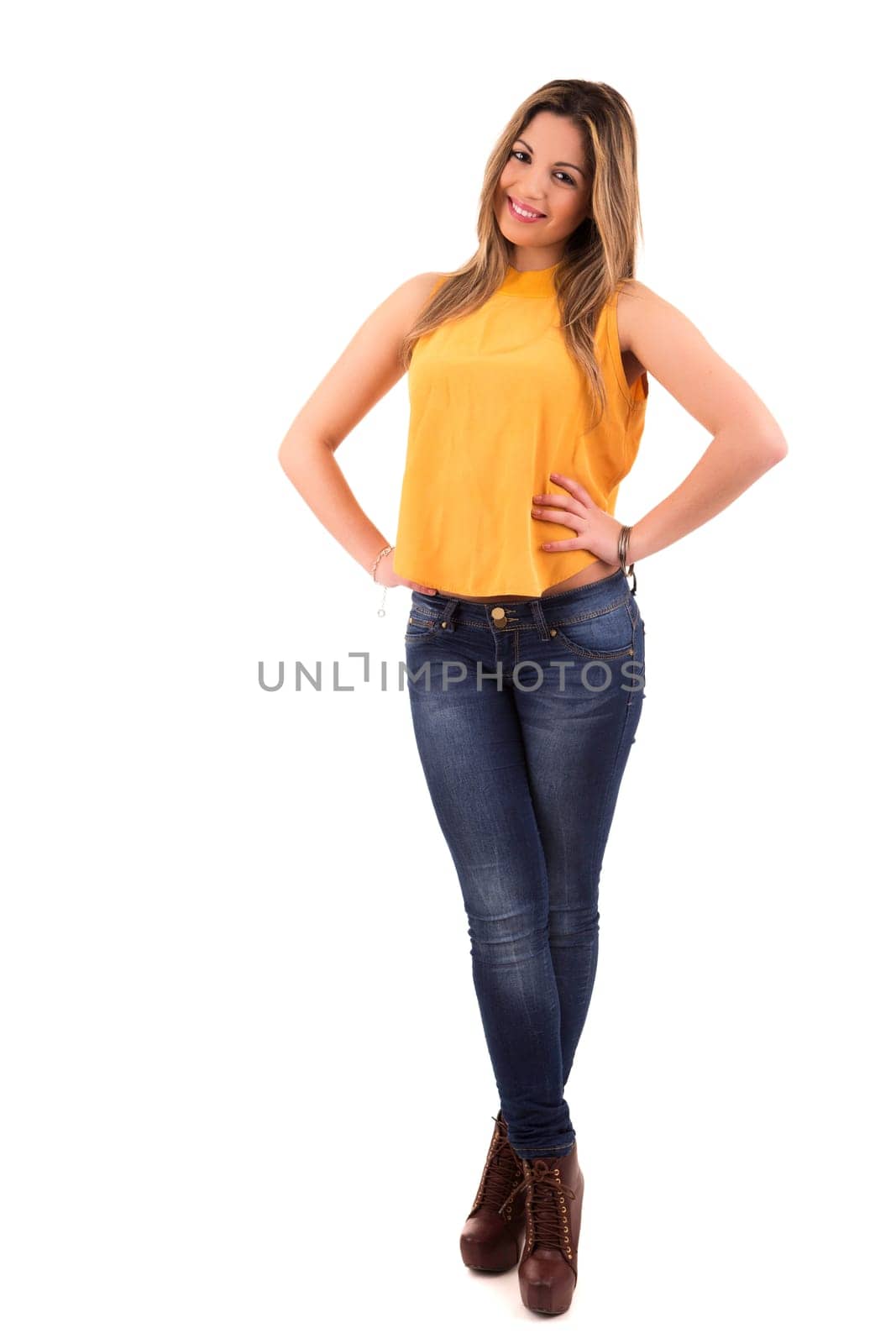 Young student woman posing over white background