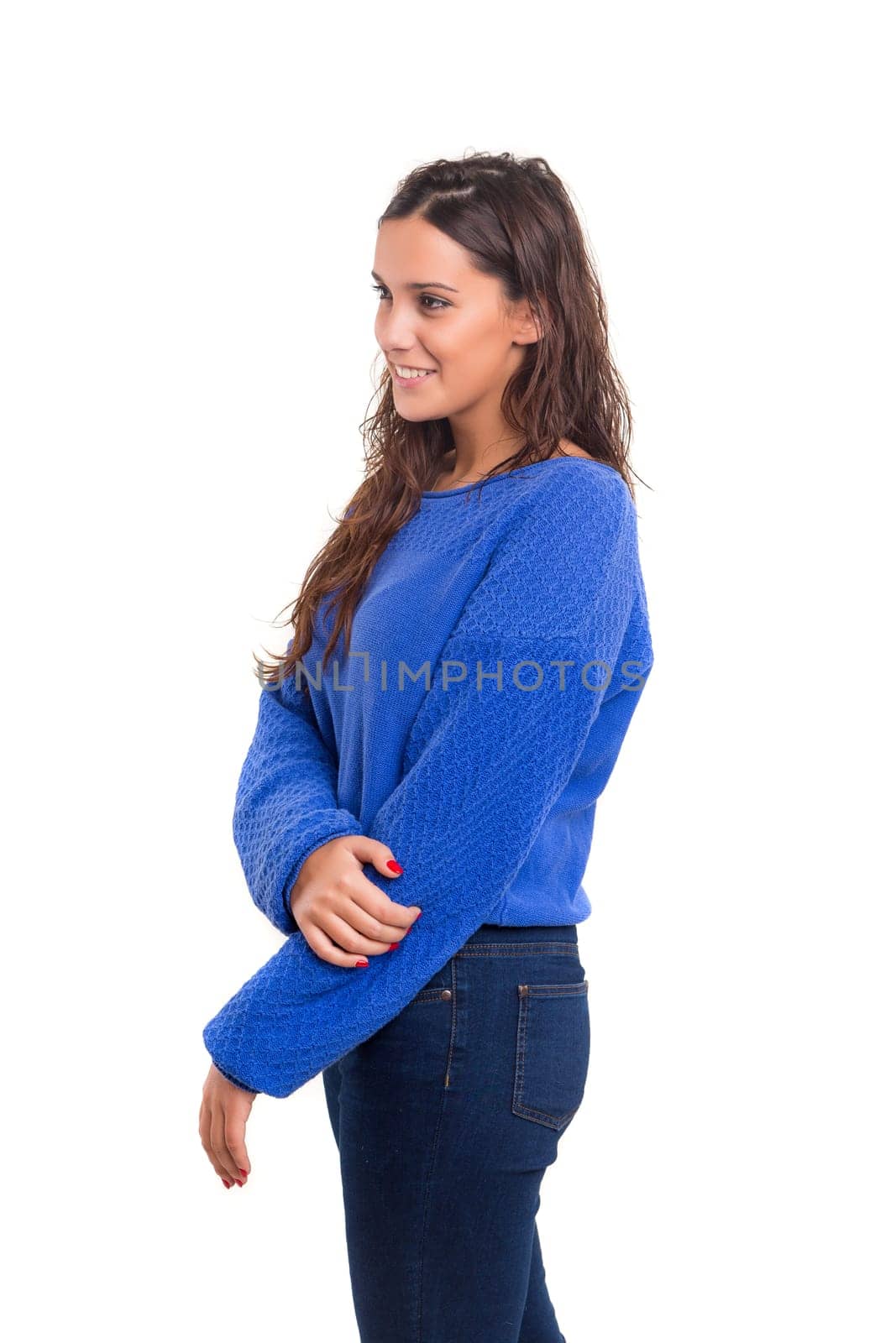Beautiful young casual woman posing isolated over white