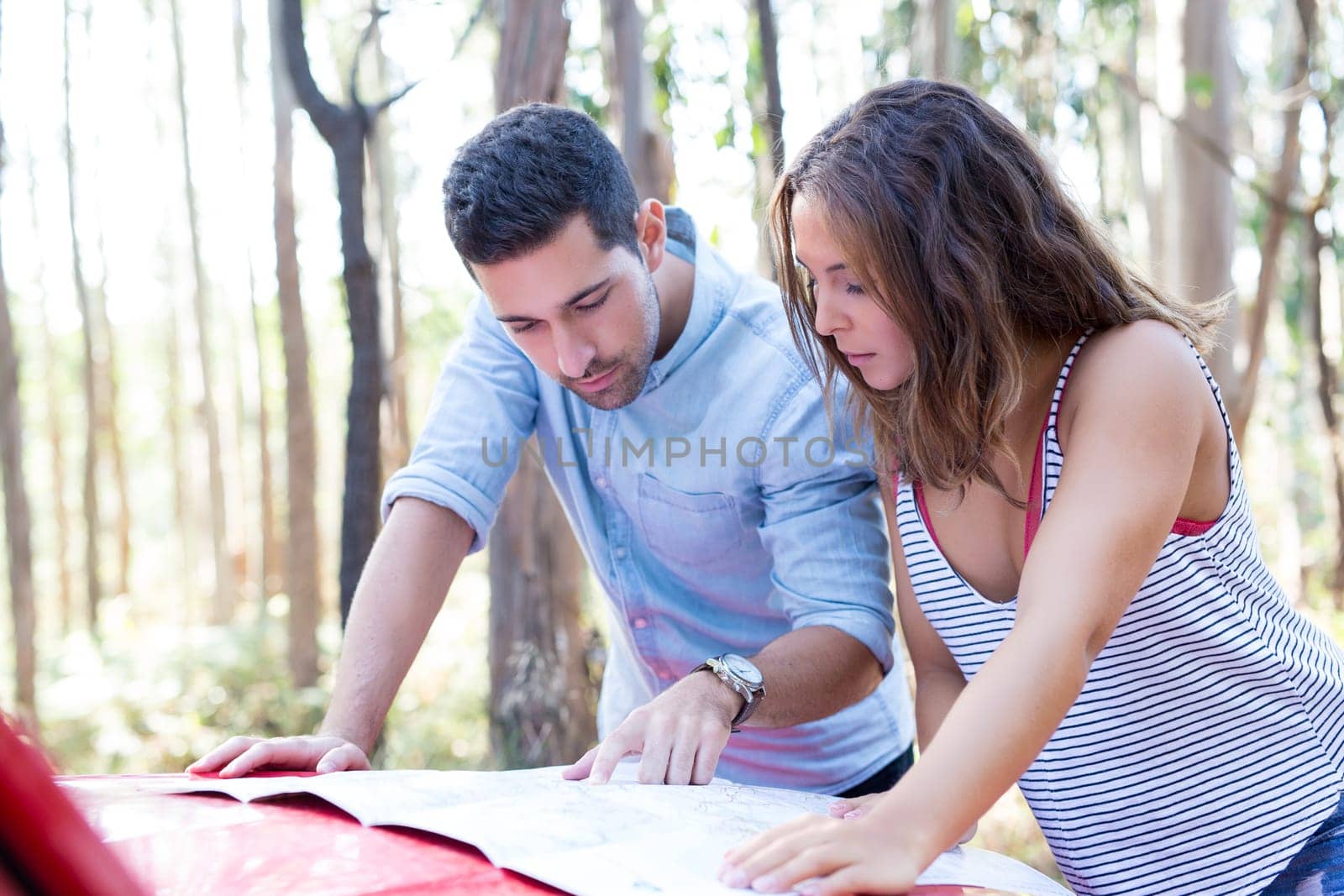 Young couple on roadtrip through countryside