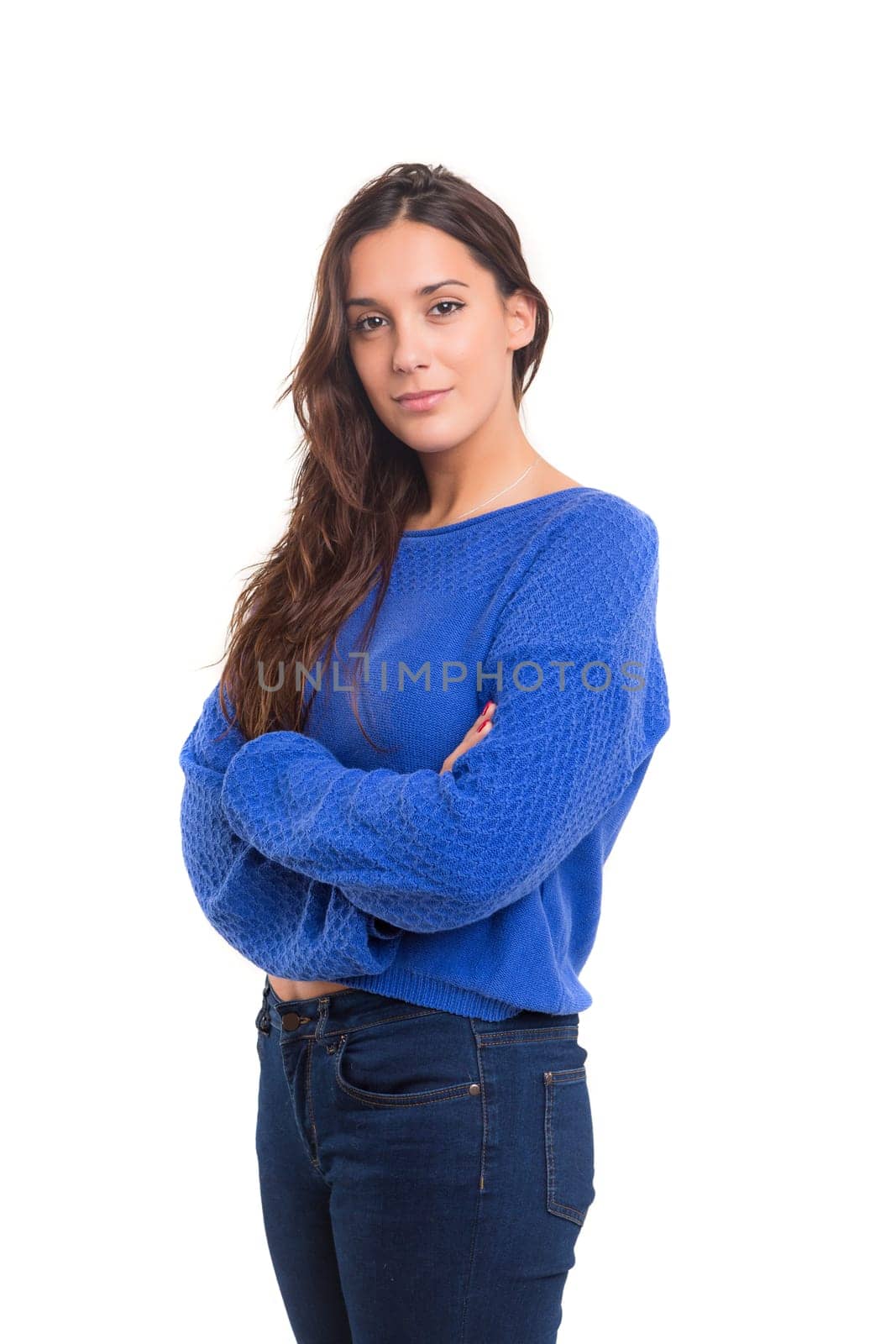 Beautiful young casual woman posing isolated over white