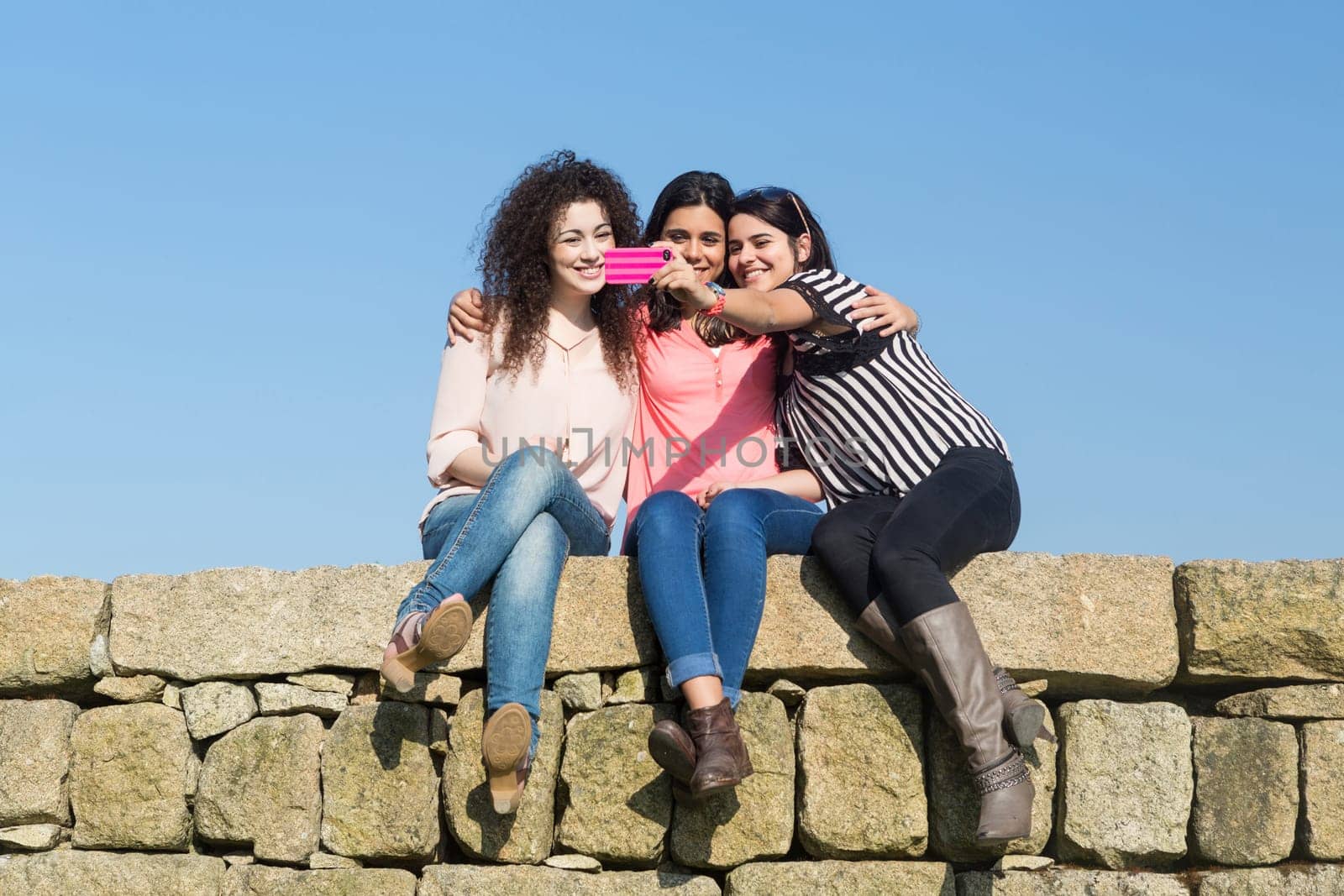 A group of students relaxing at the park