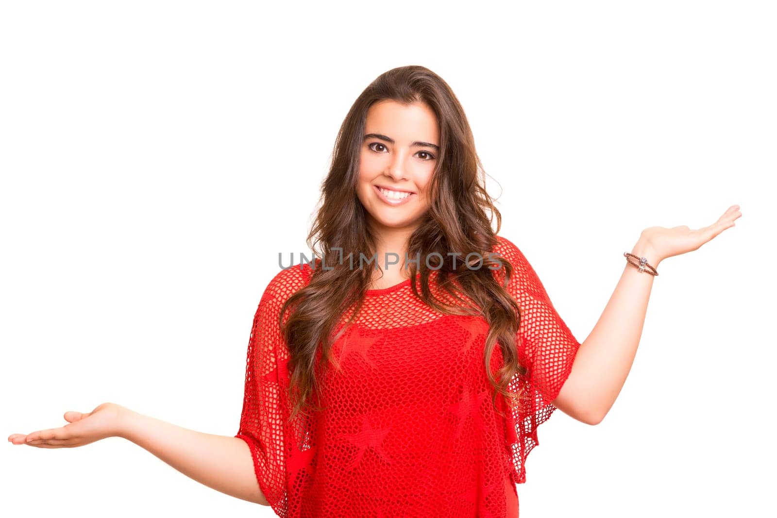 Beautiful woman making a scale with her arms wide open, isolated in a white background
