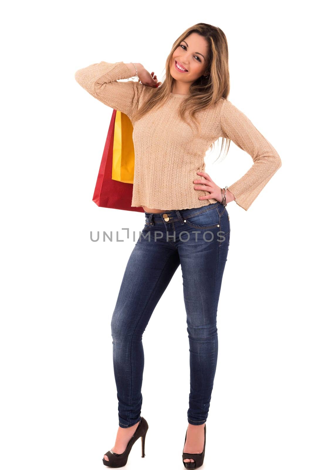 Young and beautiful woman with shopping bags