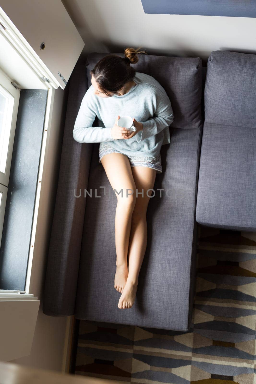 Beautiful woman relaxing with a computer