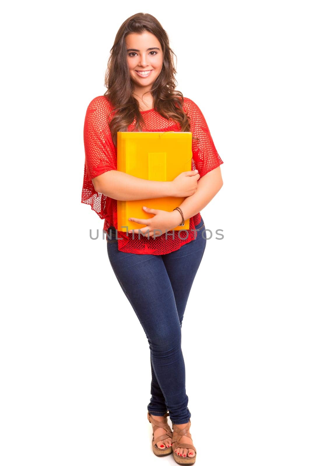 Young student woman posing over white background