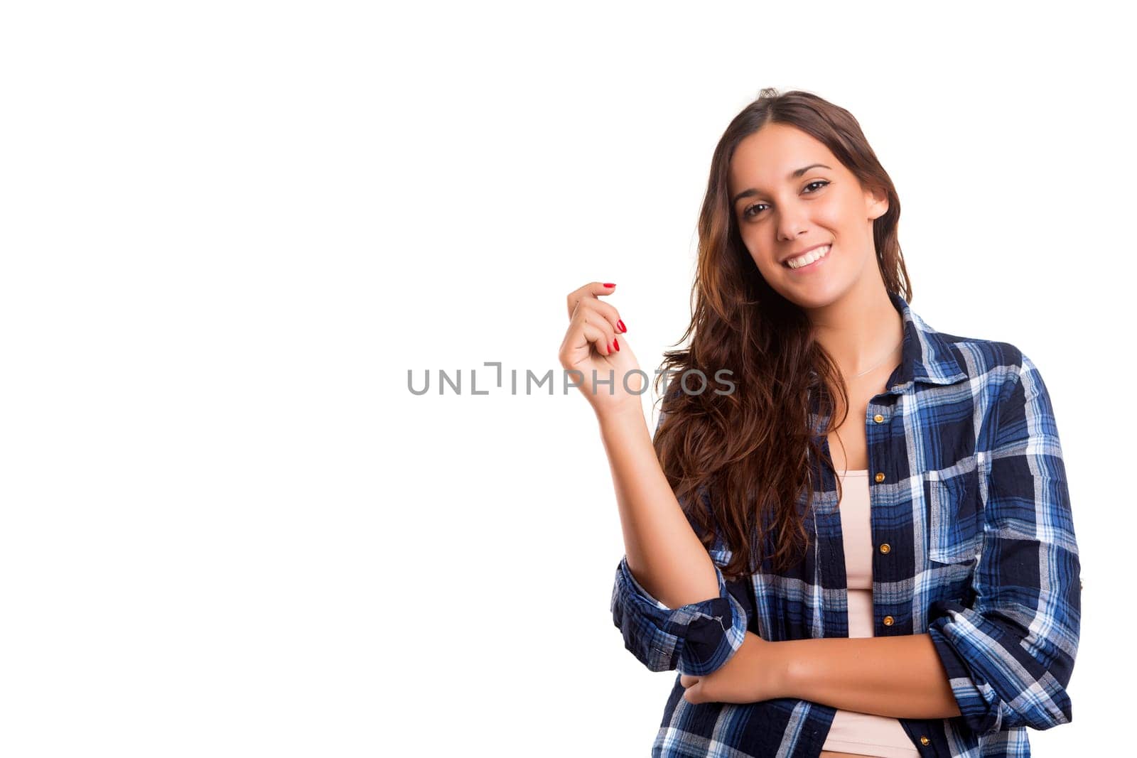Beautiful young casual woman posing isolated over white