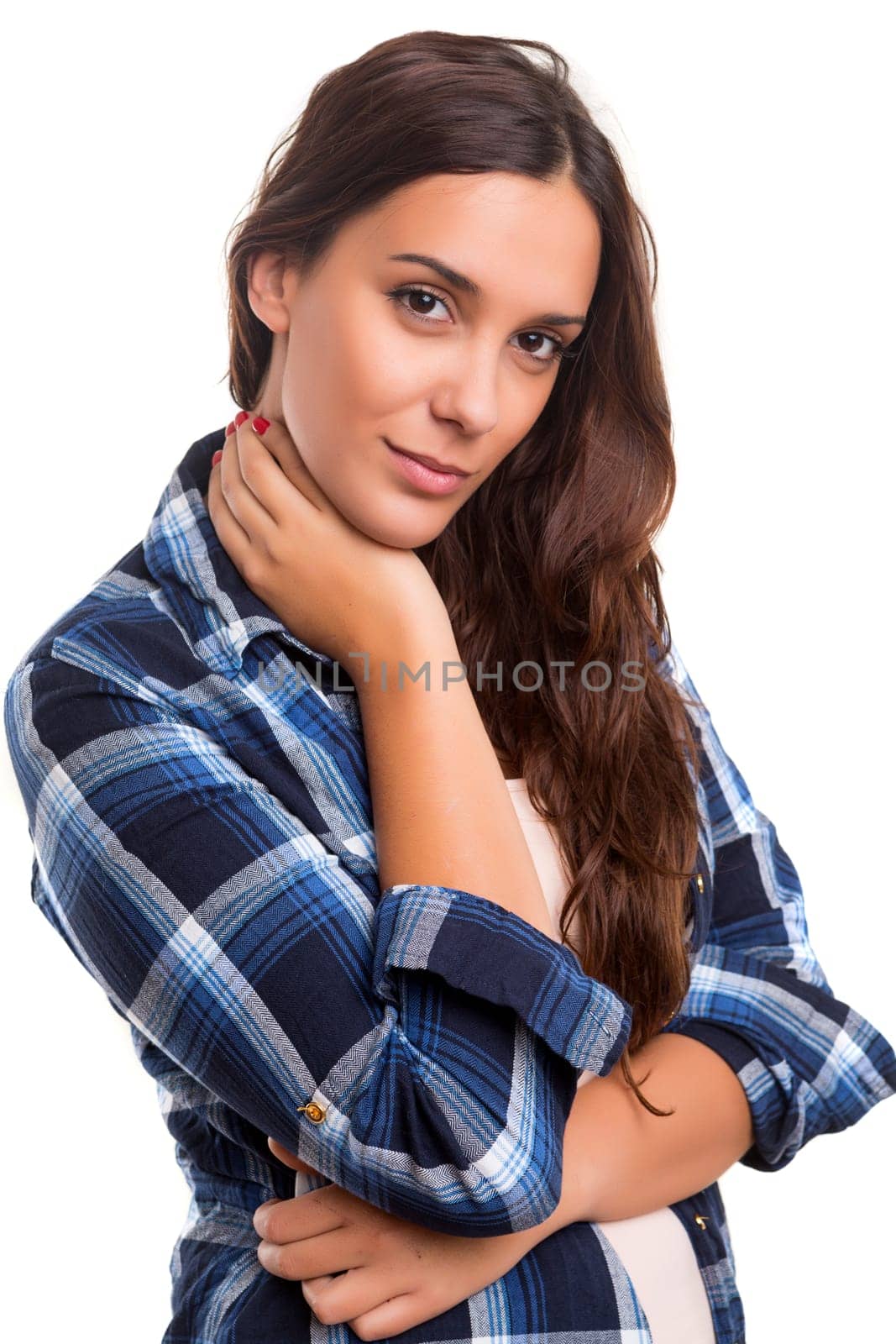Beautiful young casual woman posing isolated over white