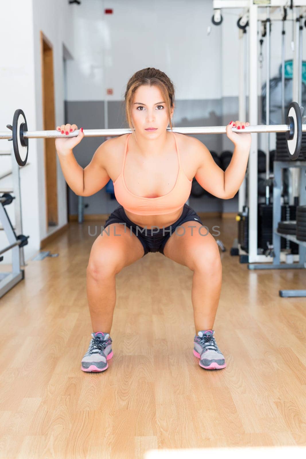 Young woman getting into shape with one more training session
