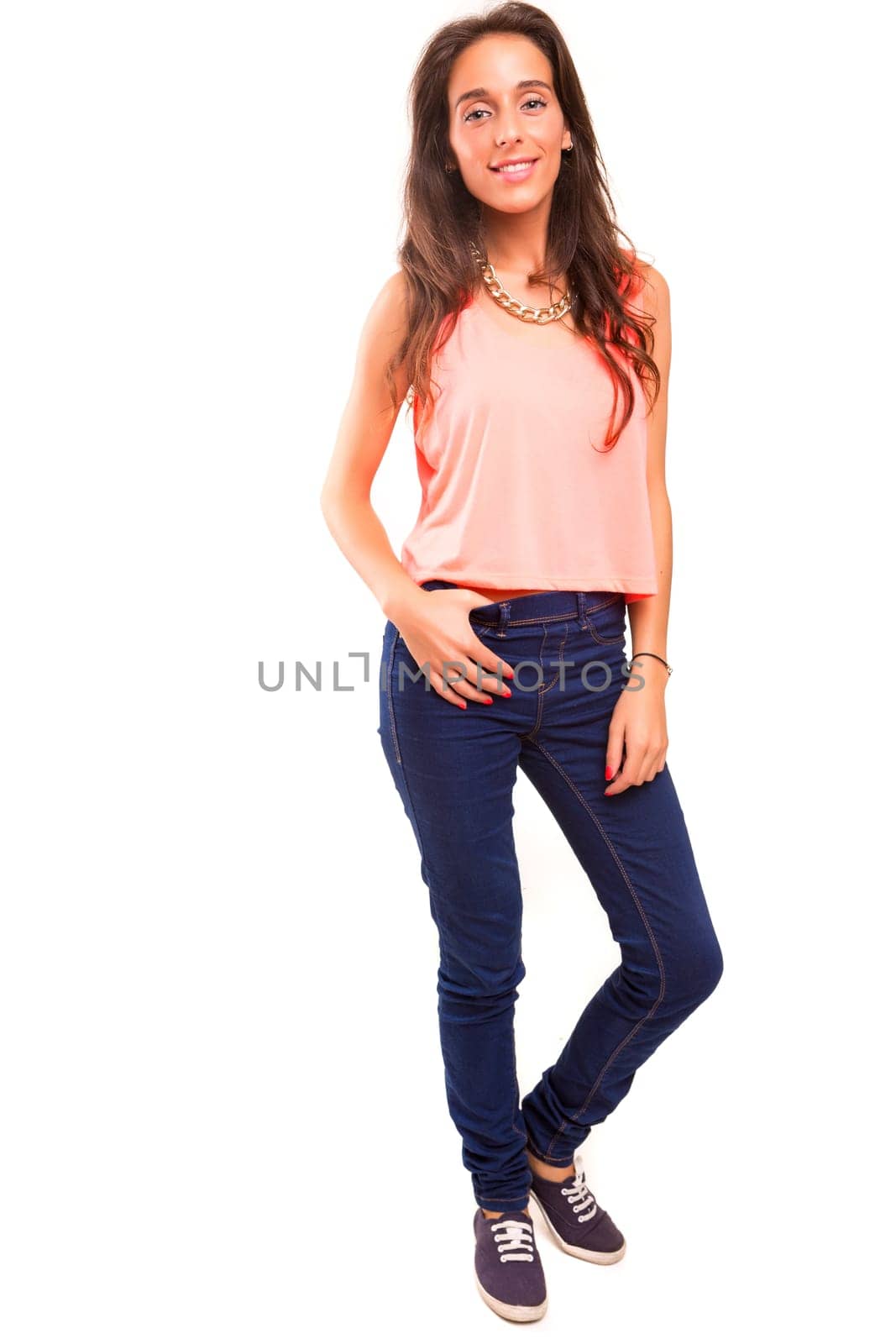 Beautiful young woman posing isolated over white background