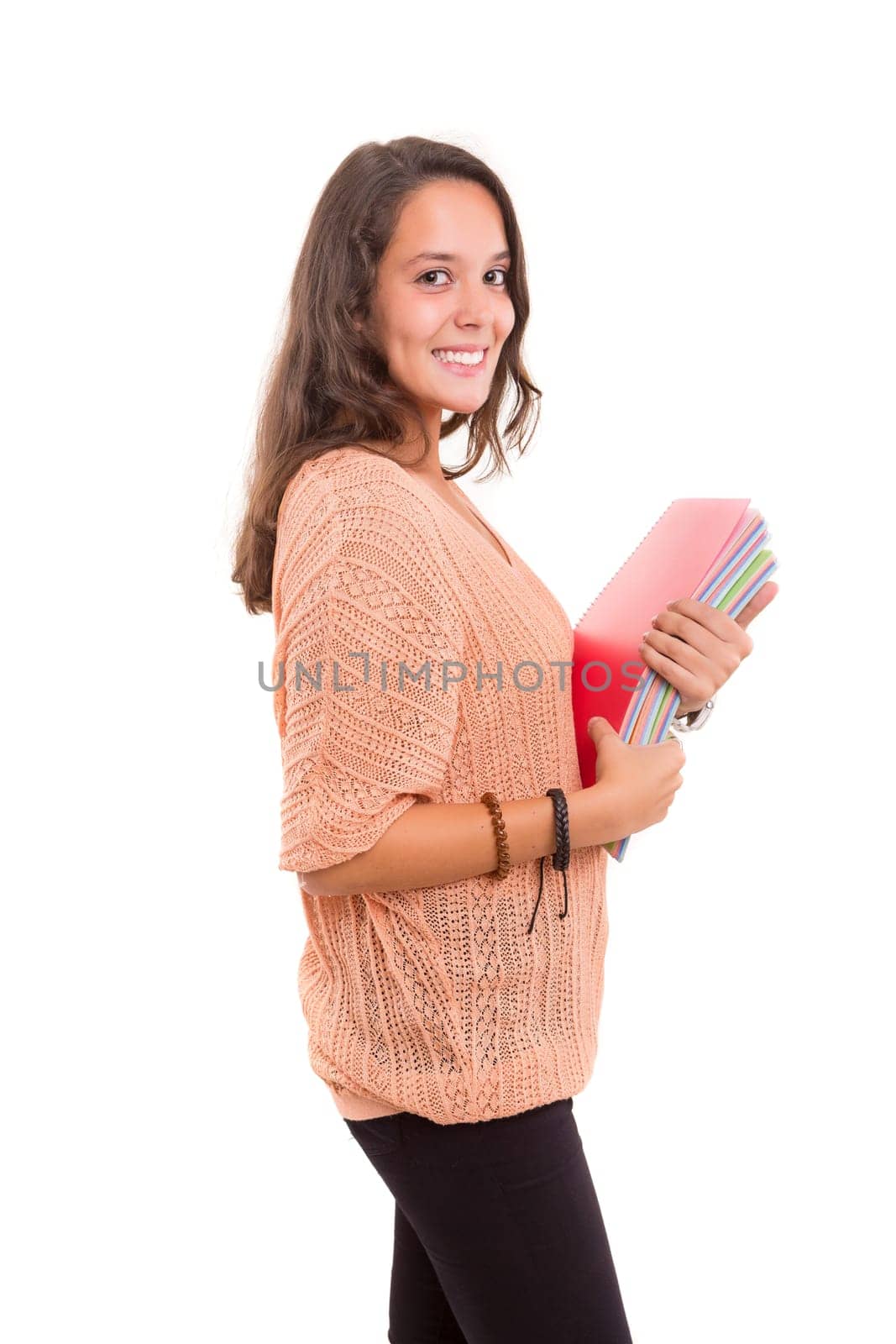 Young student posing over a white background