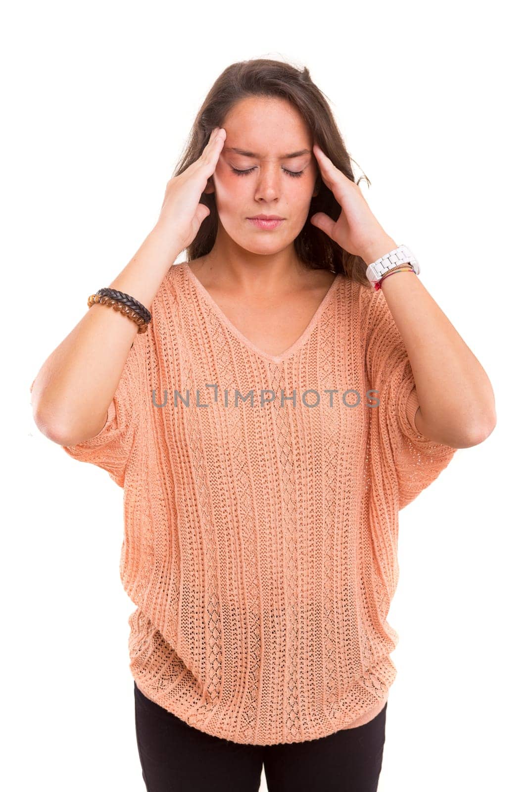 Young woman with an headache, isolated over a white background
