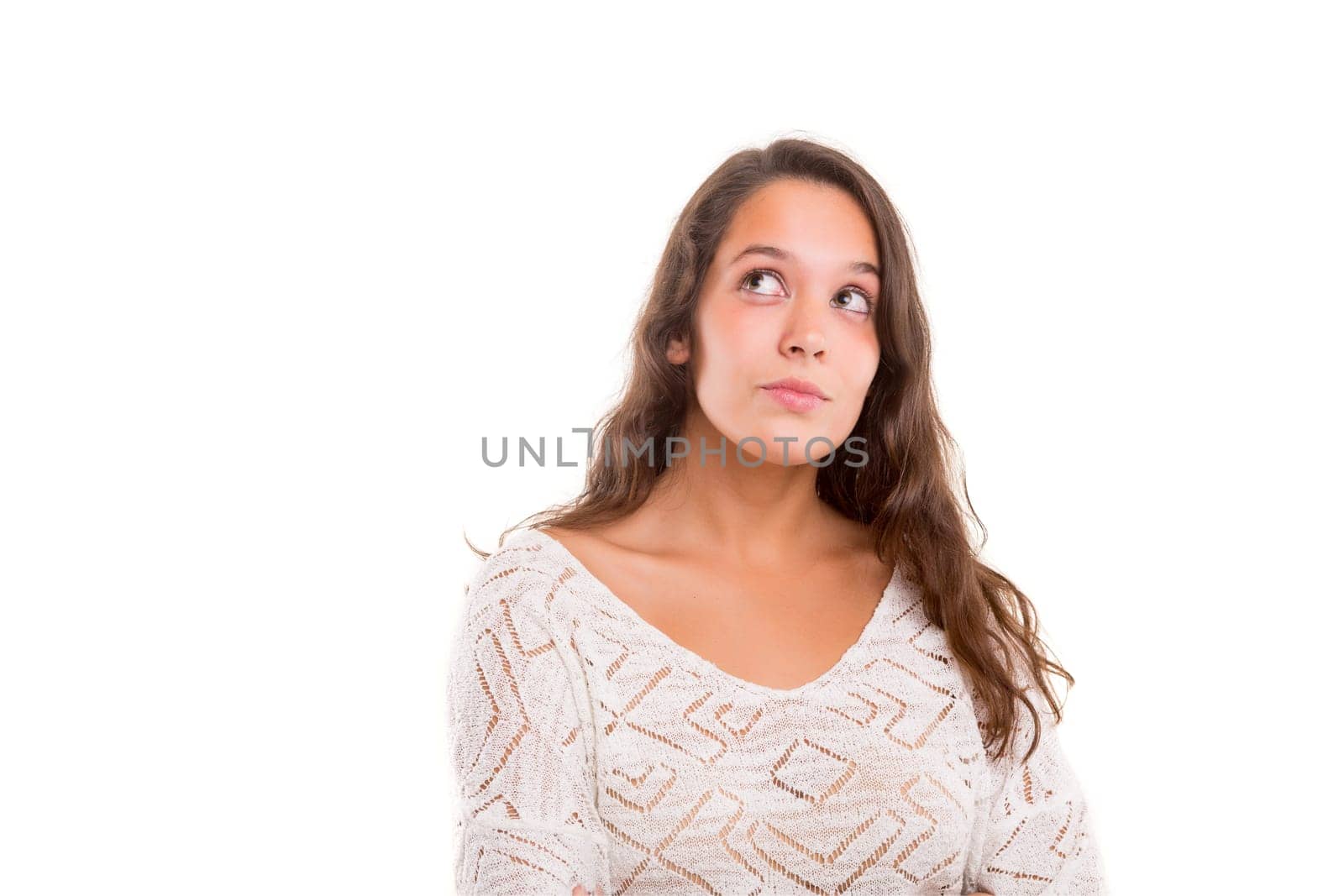 Studio shot: Young woman having a great idea