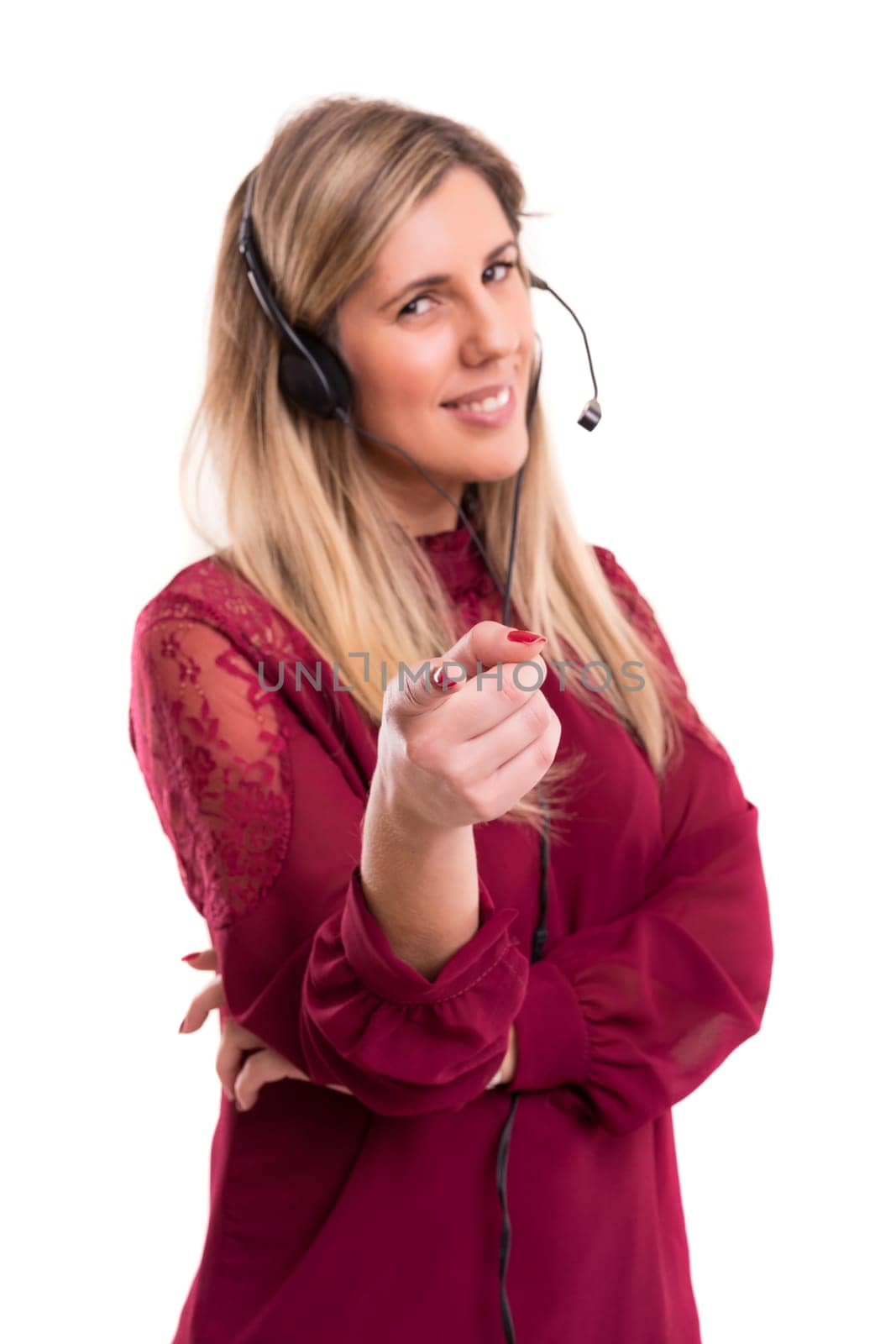 A friendly telephone operator smiling isolated over a white background