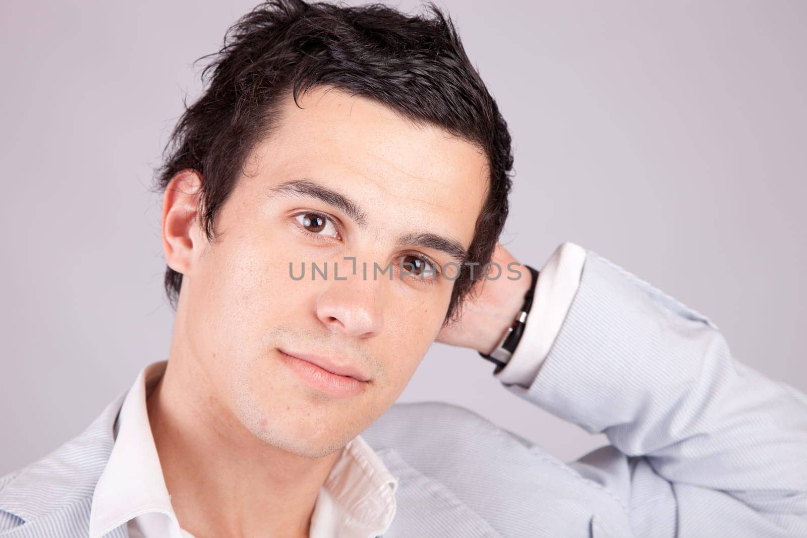 Young casual boy posing isolated