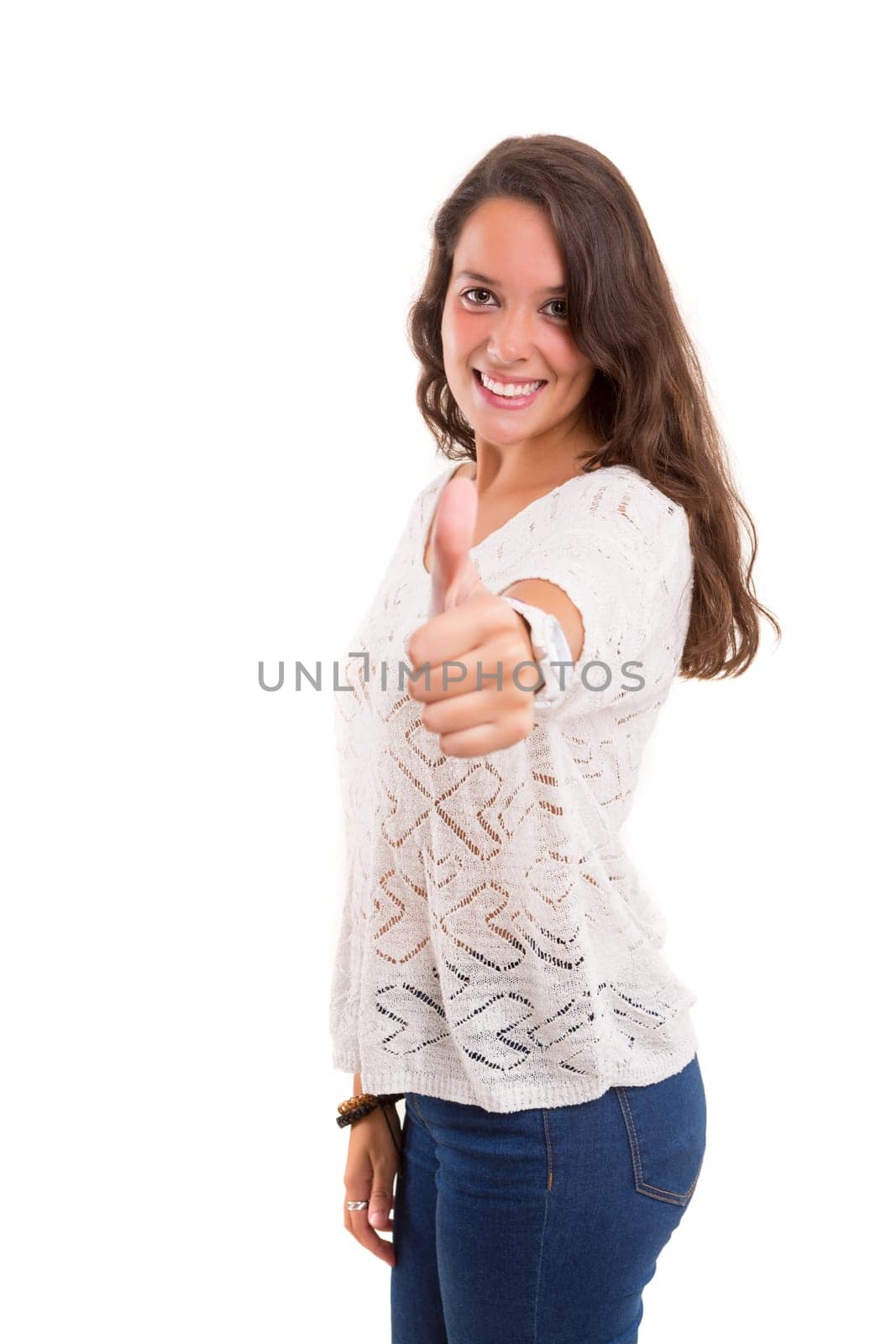 Beautiful young woman signaling ok, isolated over white