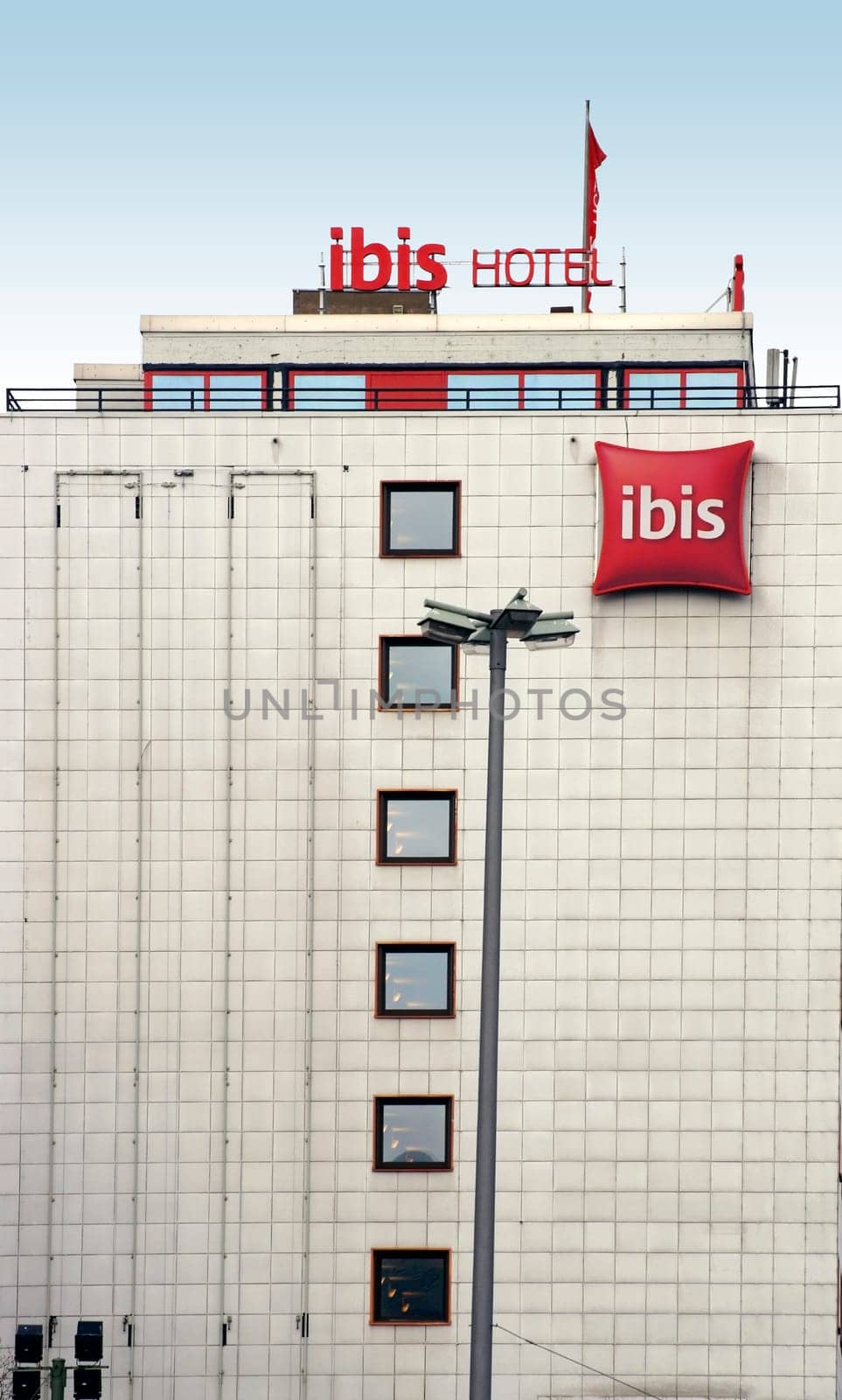 Berlin,Germany – March 01,2015: A lantern stands in front of the facade of the Hotel Ibis Berlin Messe on March 1,2015 in Berlin.
