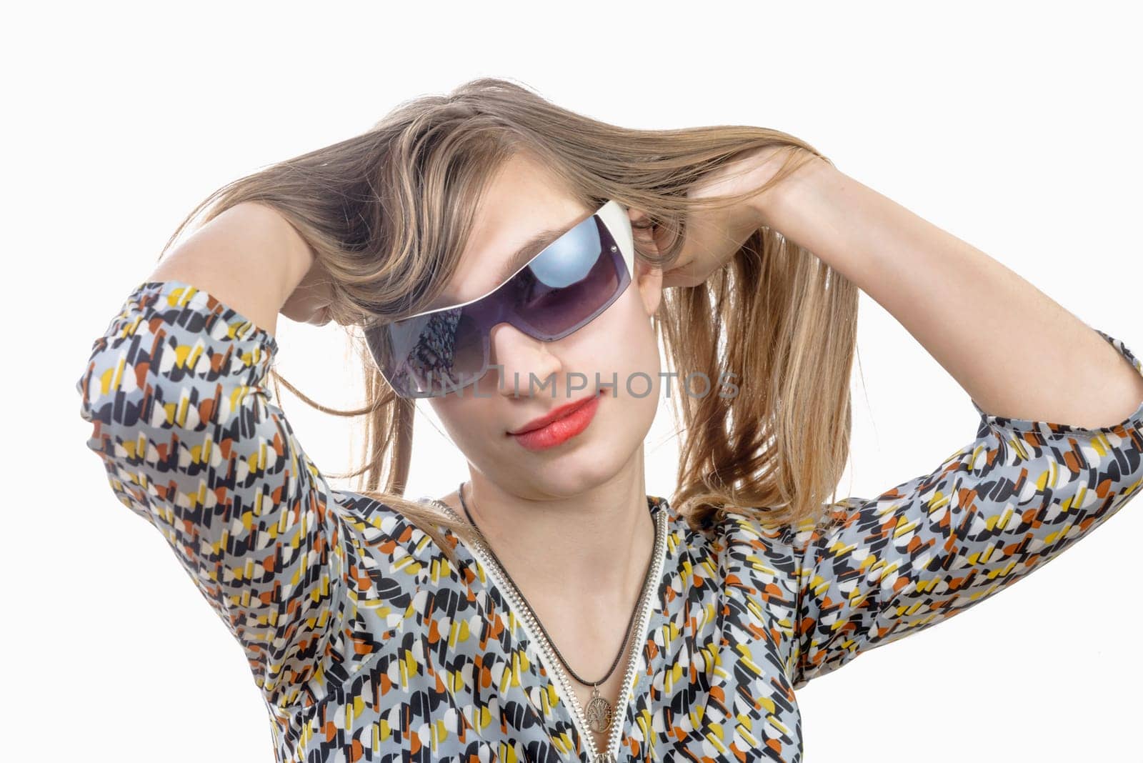 portrait of a teenage girl with glasses on white background