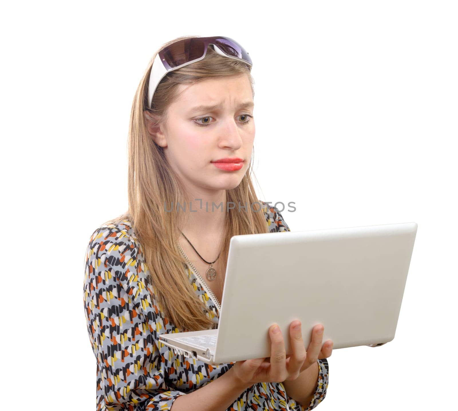 teenage girl with a laptop on the white background