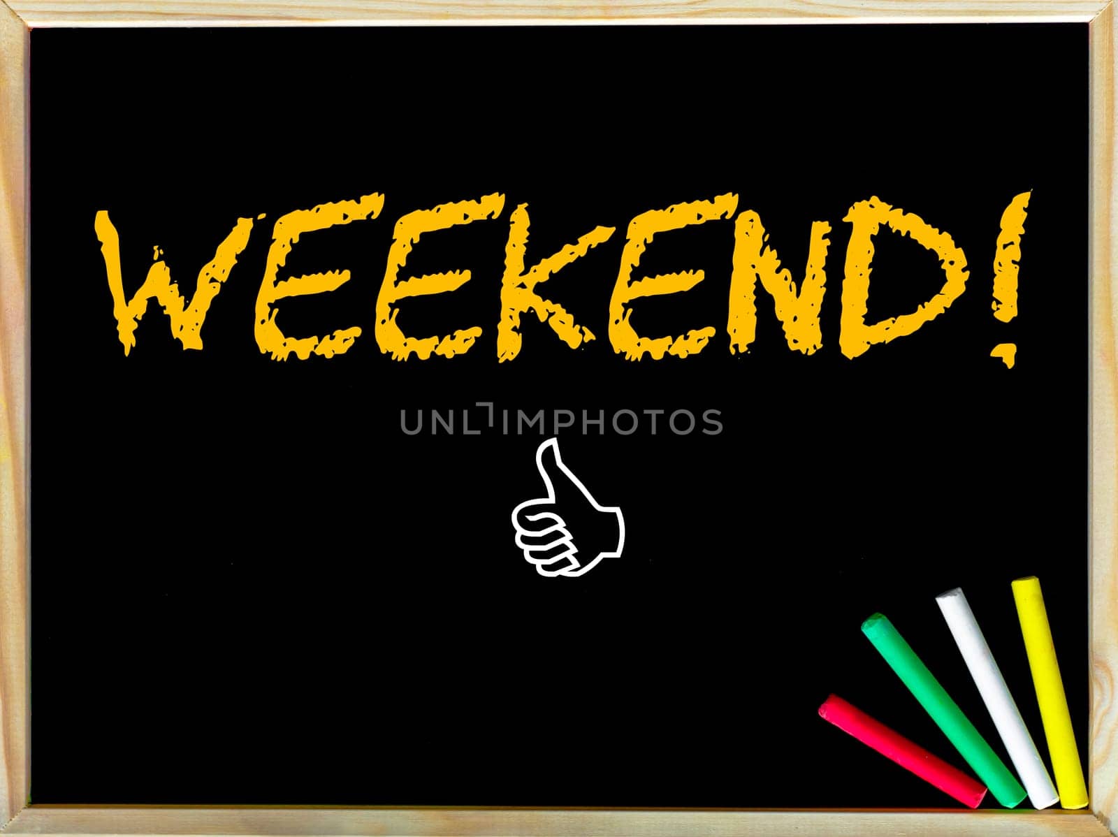Weekend  message and Like sign.Handwriting with chalk on wooden frame blackboard, colored chalk in the corner, Leisure concept image