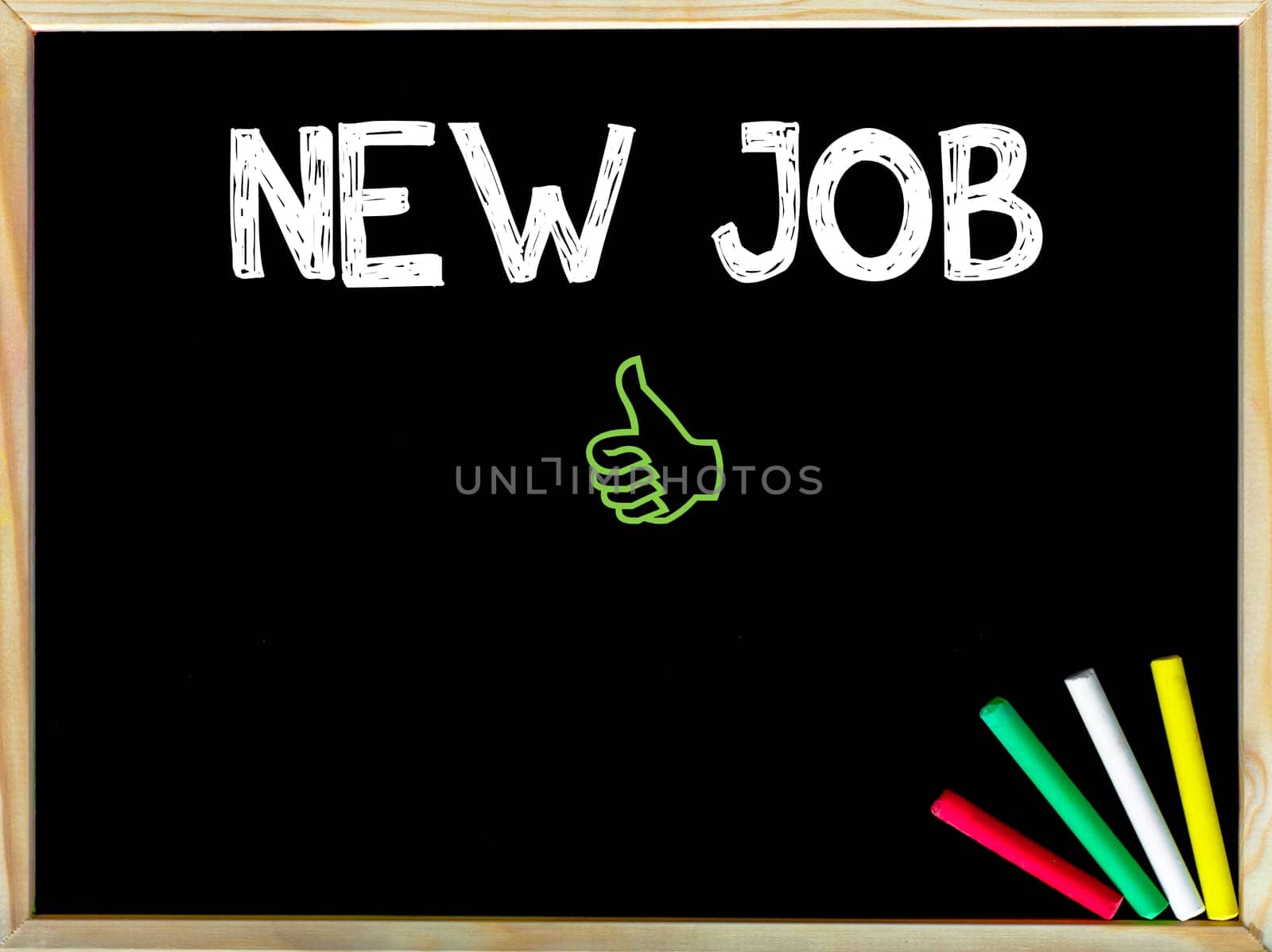 New Job message and Like sign.Handwriting with chalk on wooden frame blackboard, colored chalk in the corner, Career change concept image
