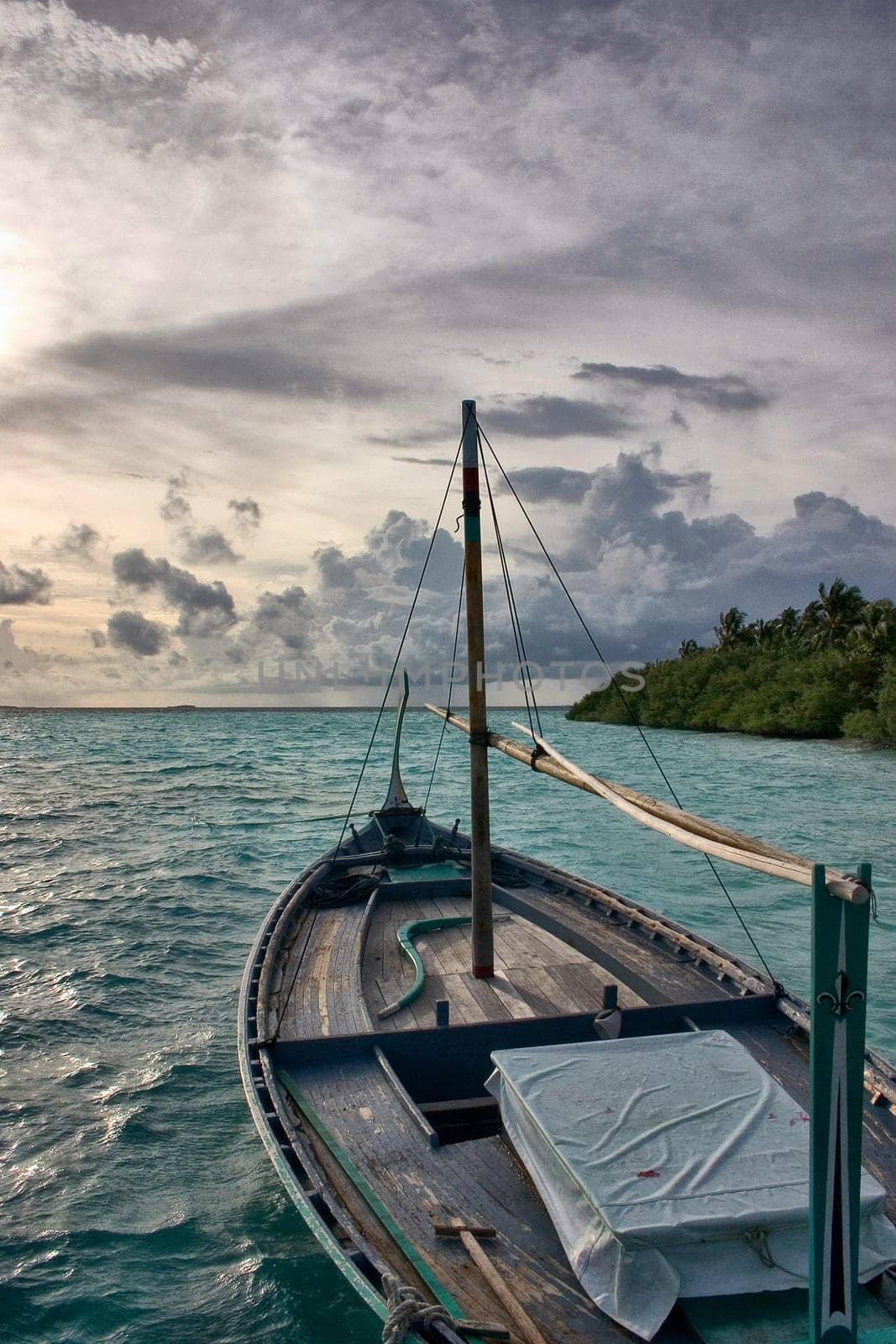 traditional Maldivian Dhoni in sunset - Maldives - South Male Atoll