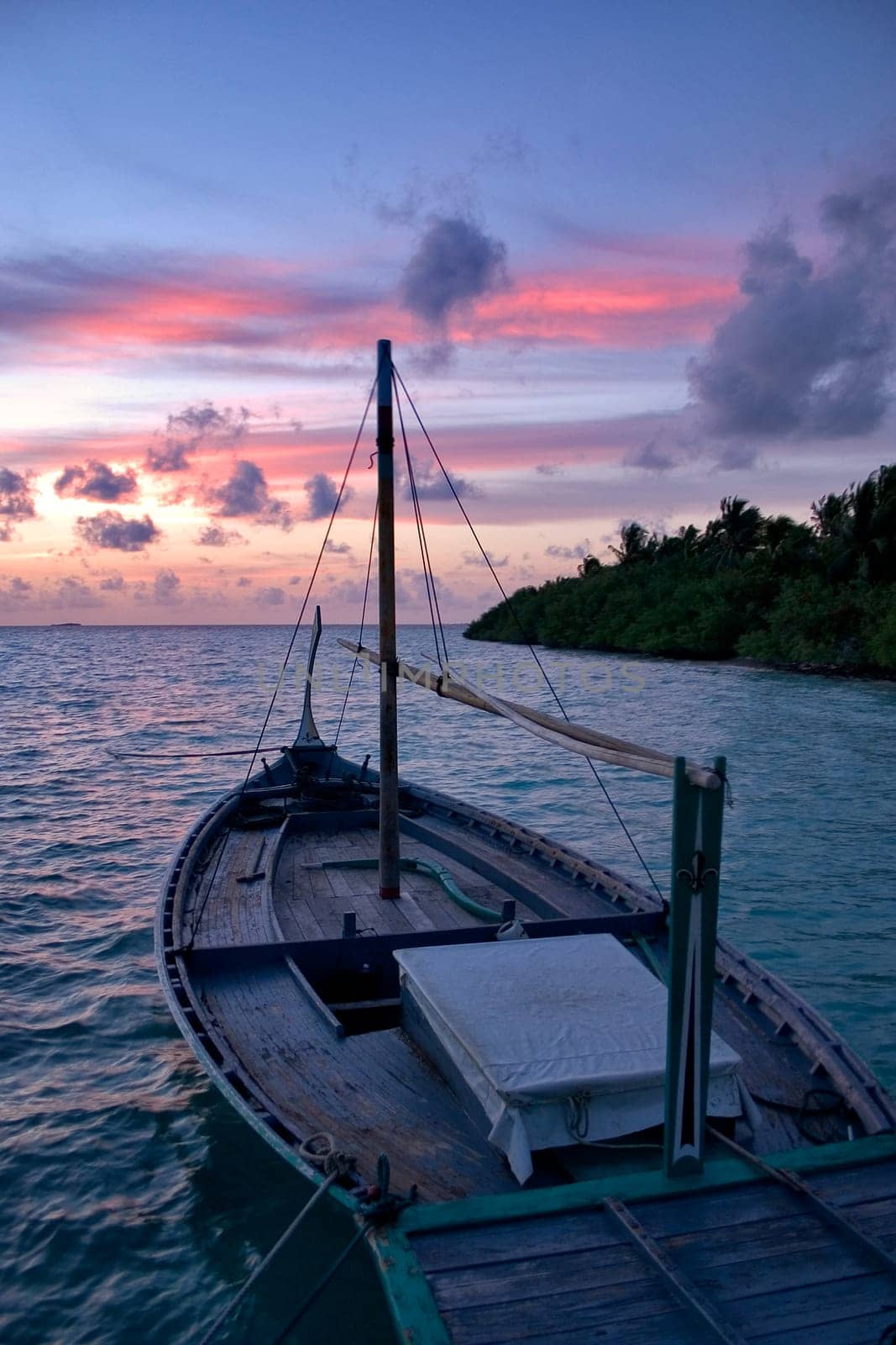 traditional Maldivian Dhoni in sunset - Maldives - South Male Atoll