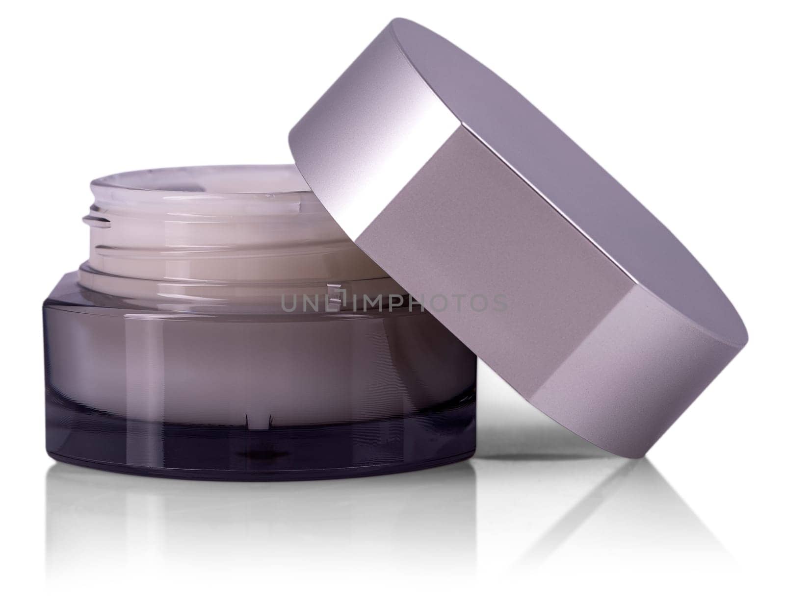 The cosmetic cream in container isolated on white background