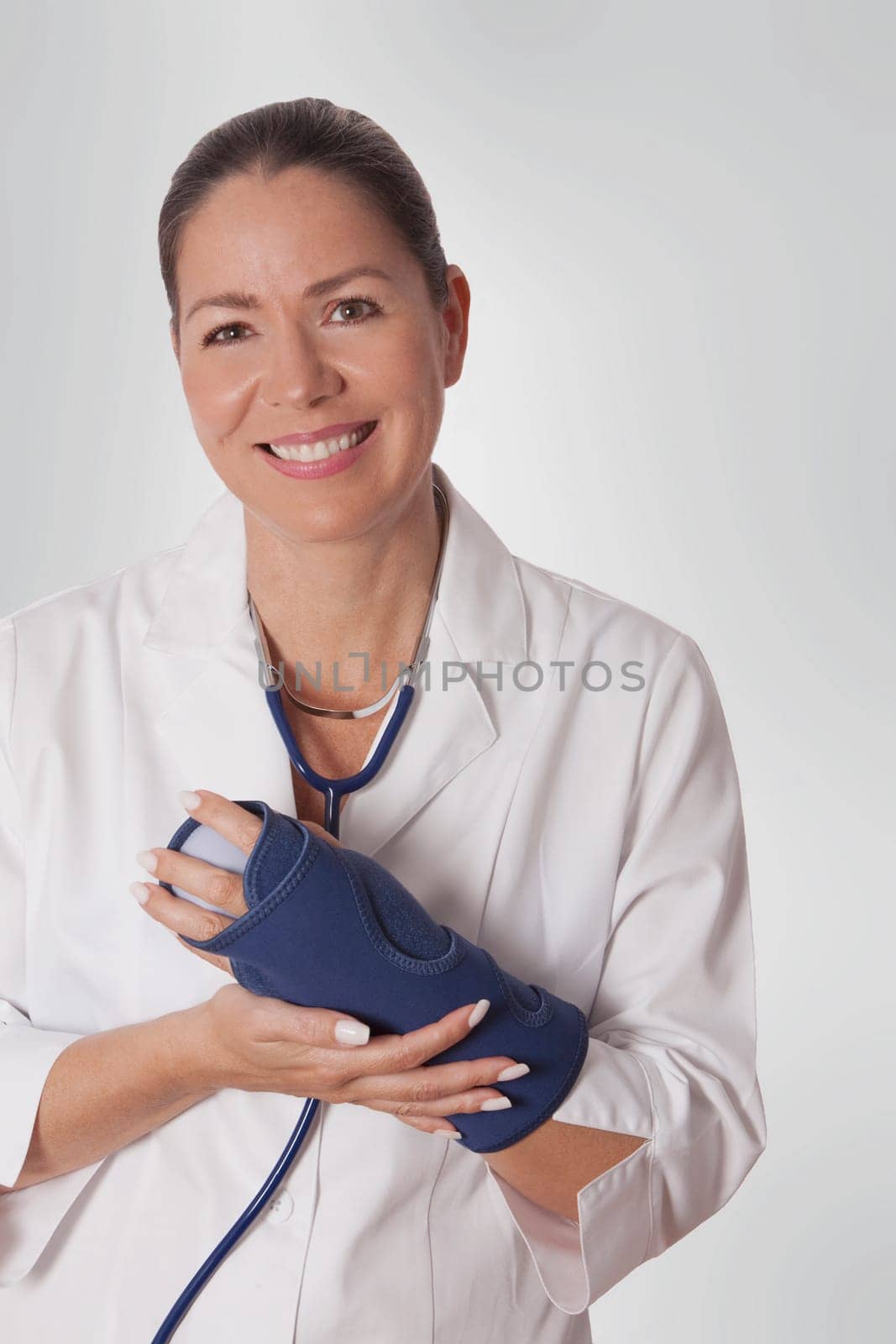 Female doctor wearing a wrist brace