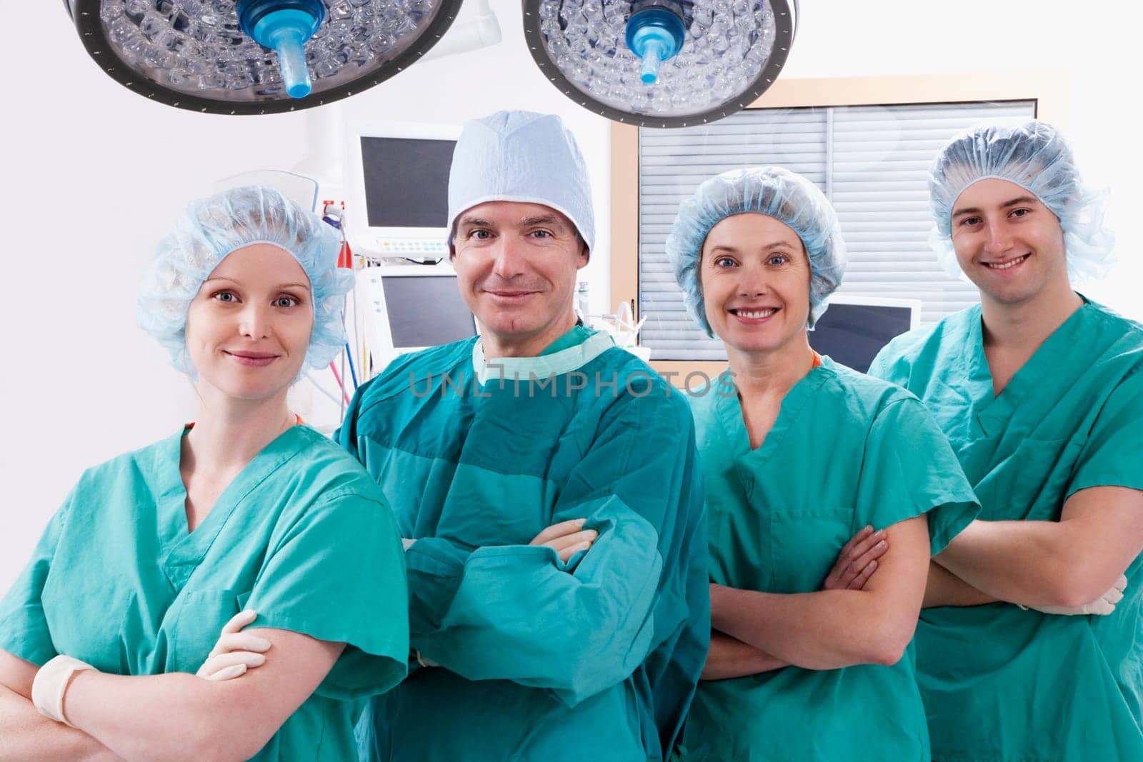 Surgeons smiling in an operating room