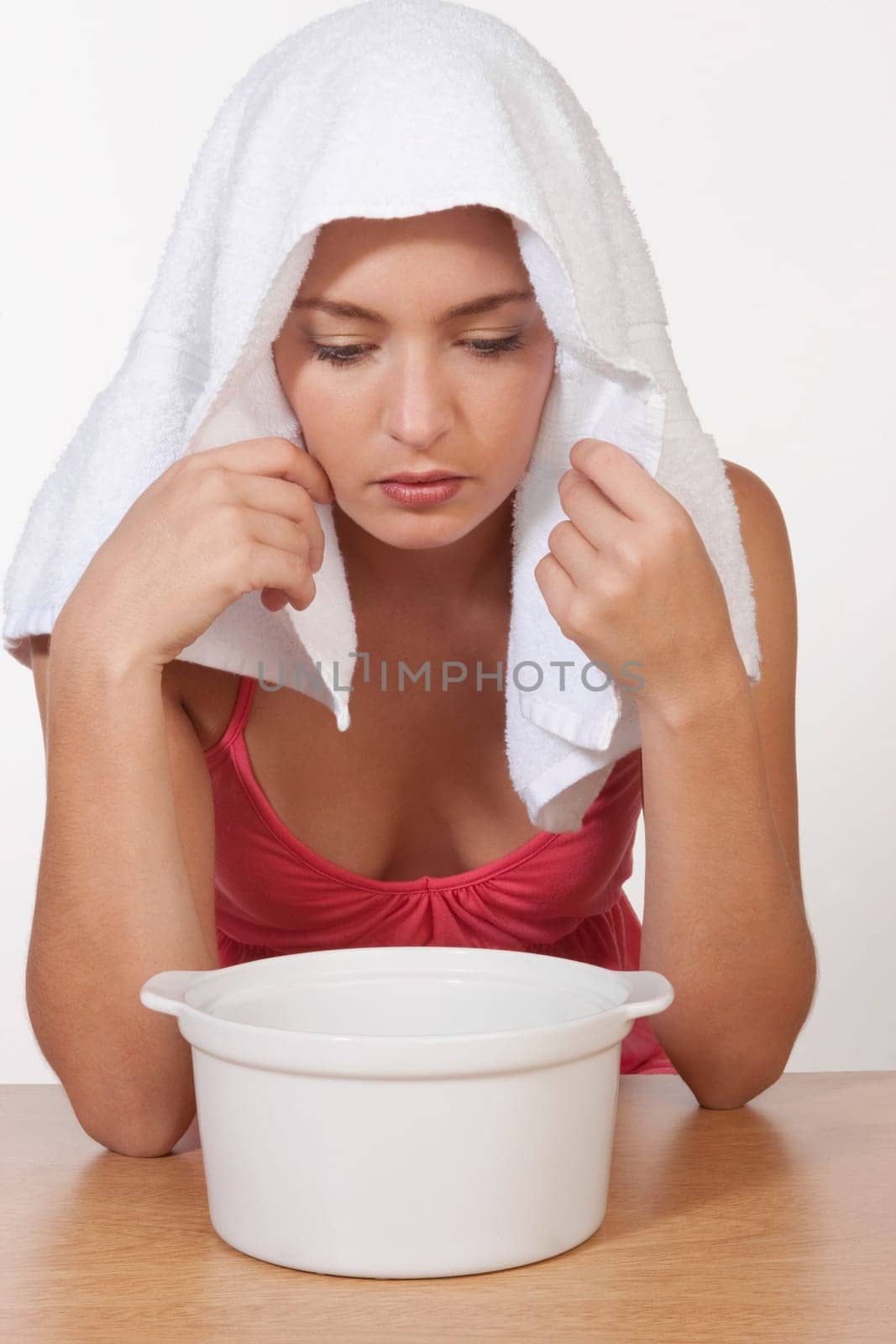 Woman inhaling steam