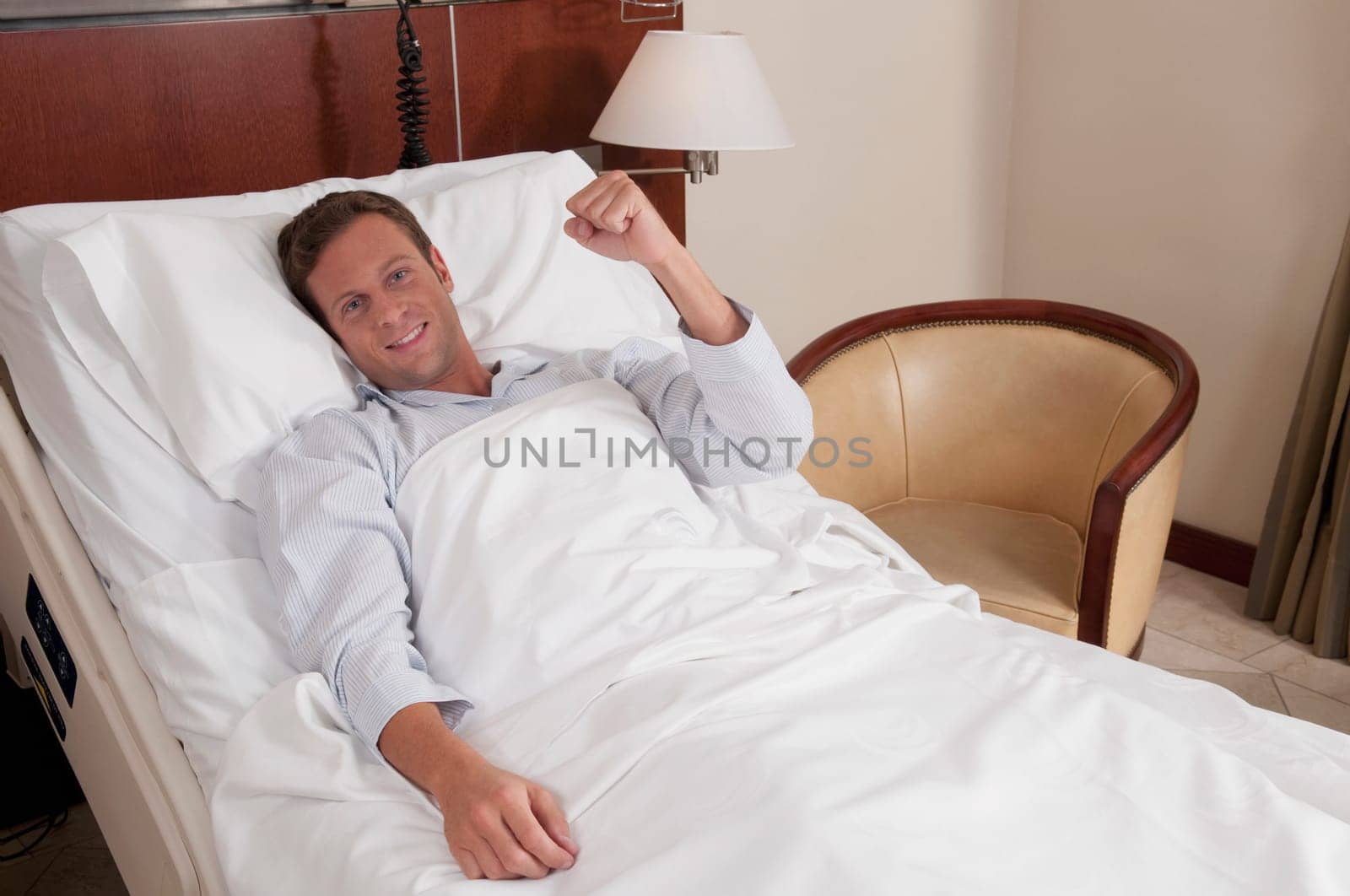 Man lying in a hospital bed