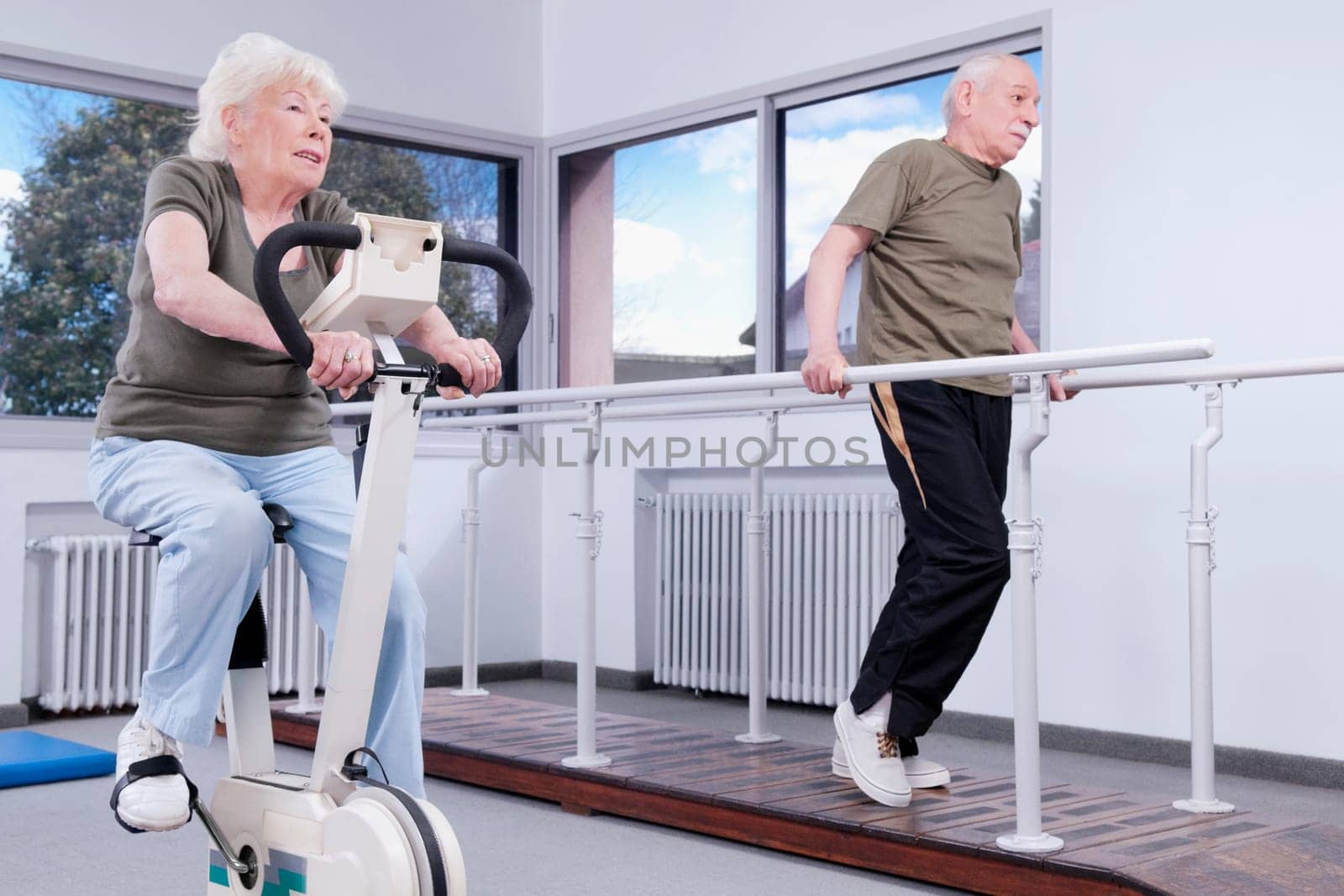 Couple exercising in a rehabilitation center