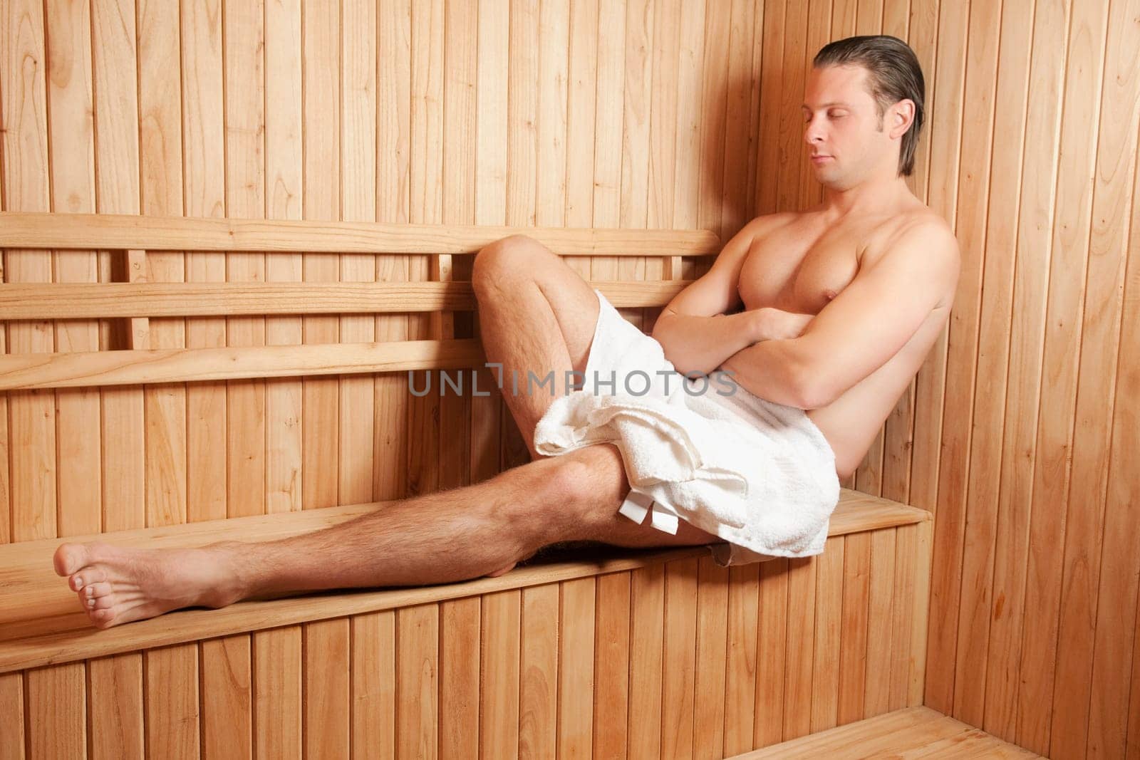 Man taking a sauna bath