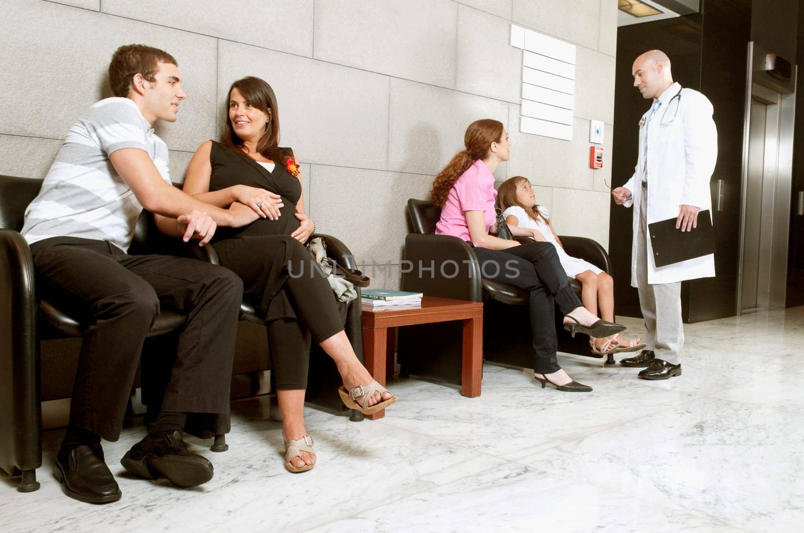 Patients and a doctor in a waiting room