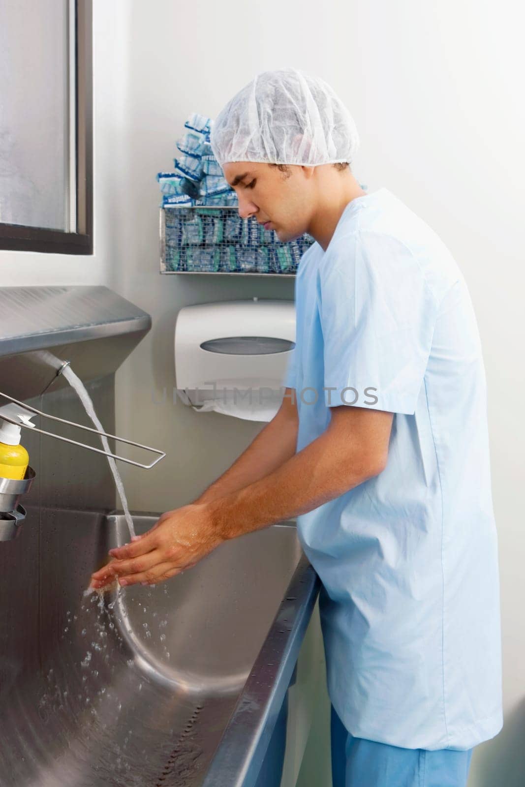 Surgeon washing hands