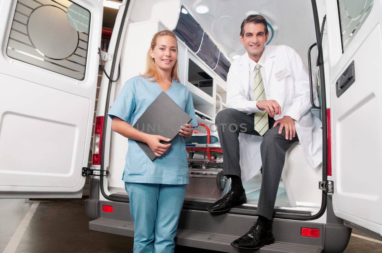 Doctor with a female nurse in an ambulance