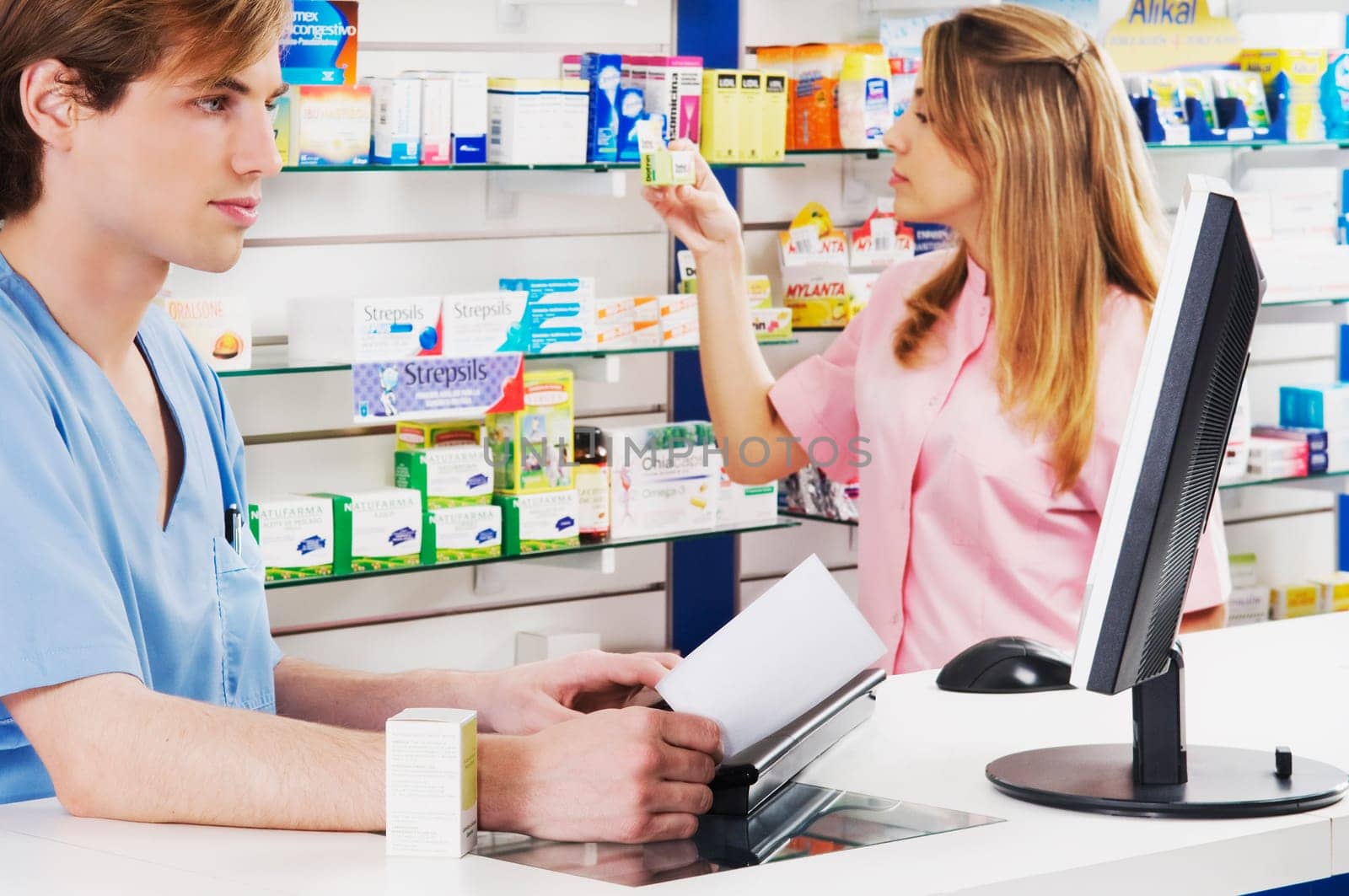 Two pharmacists in a pharmacy