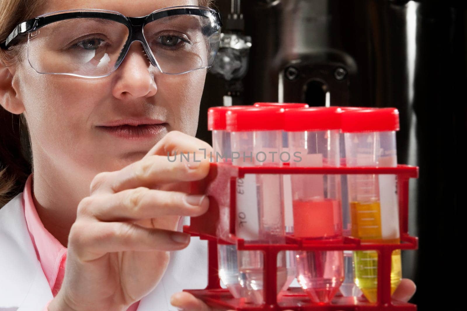 Female doctor holding medical samples in a laboratory