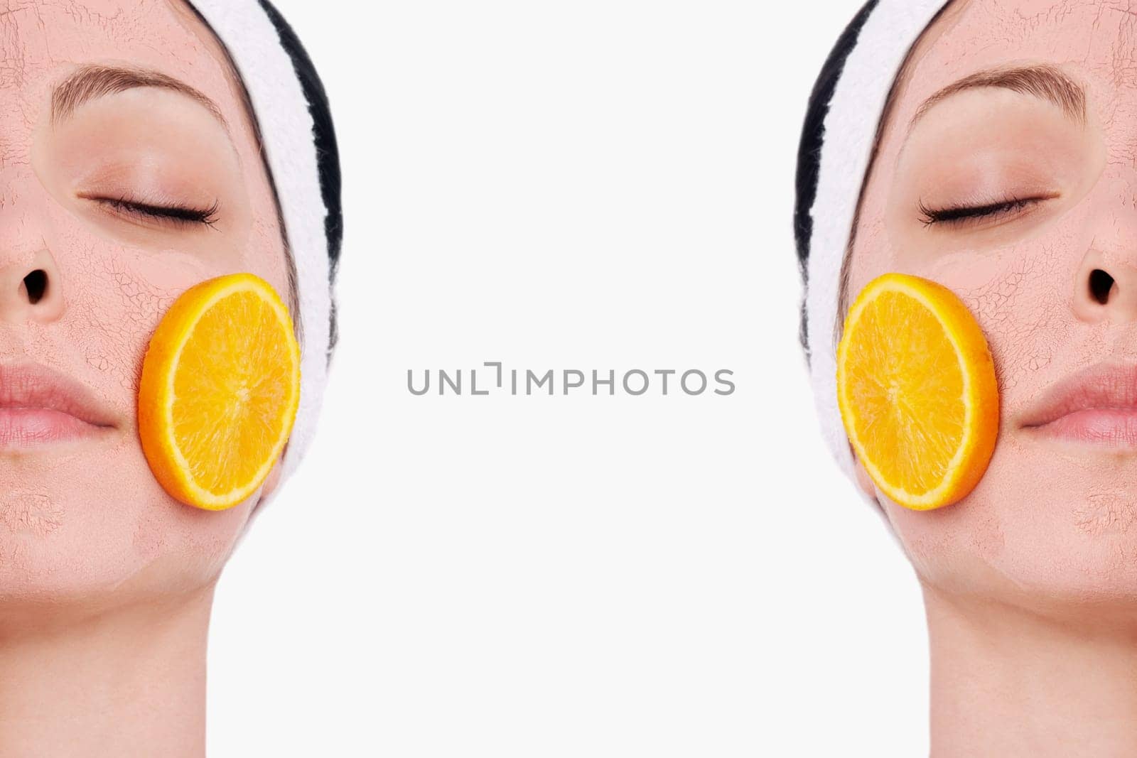 Orange slices on a womanŽs face