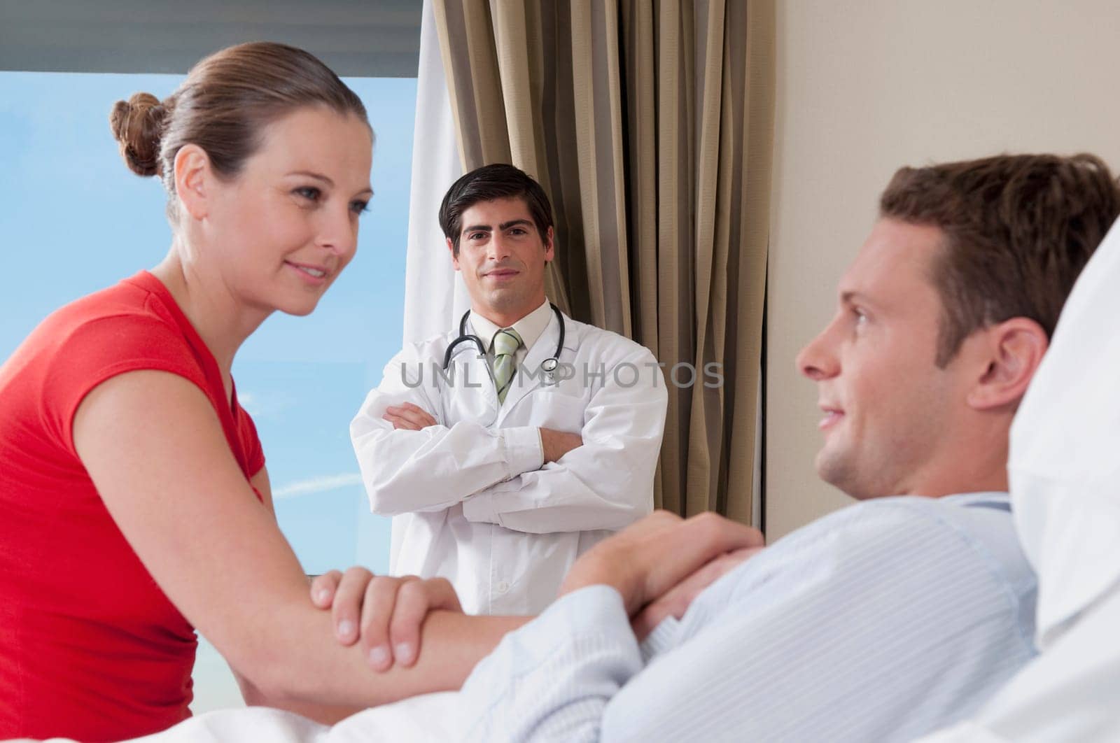 Woman in a hospital with her husband