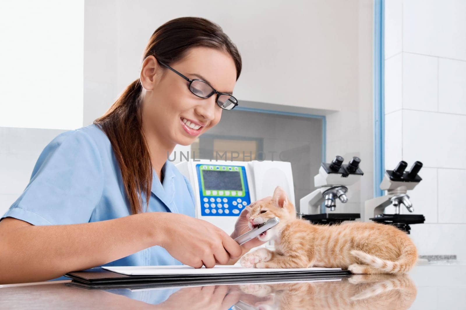 Female vet writing a prescription