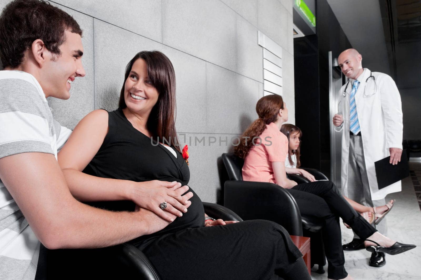 Patients and a doctor in a waiting room