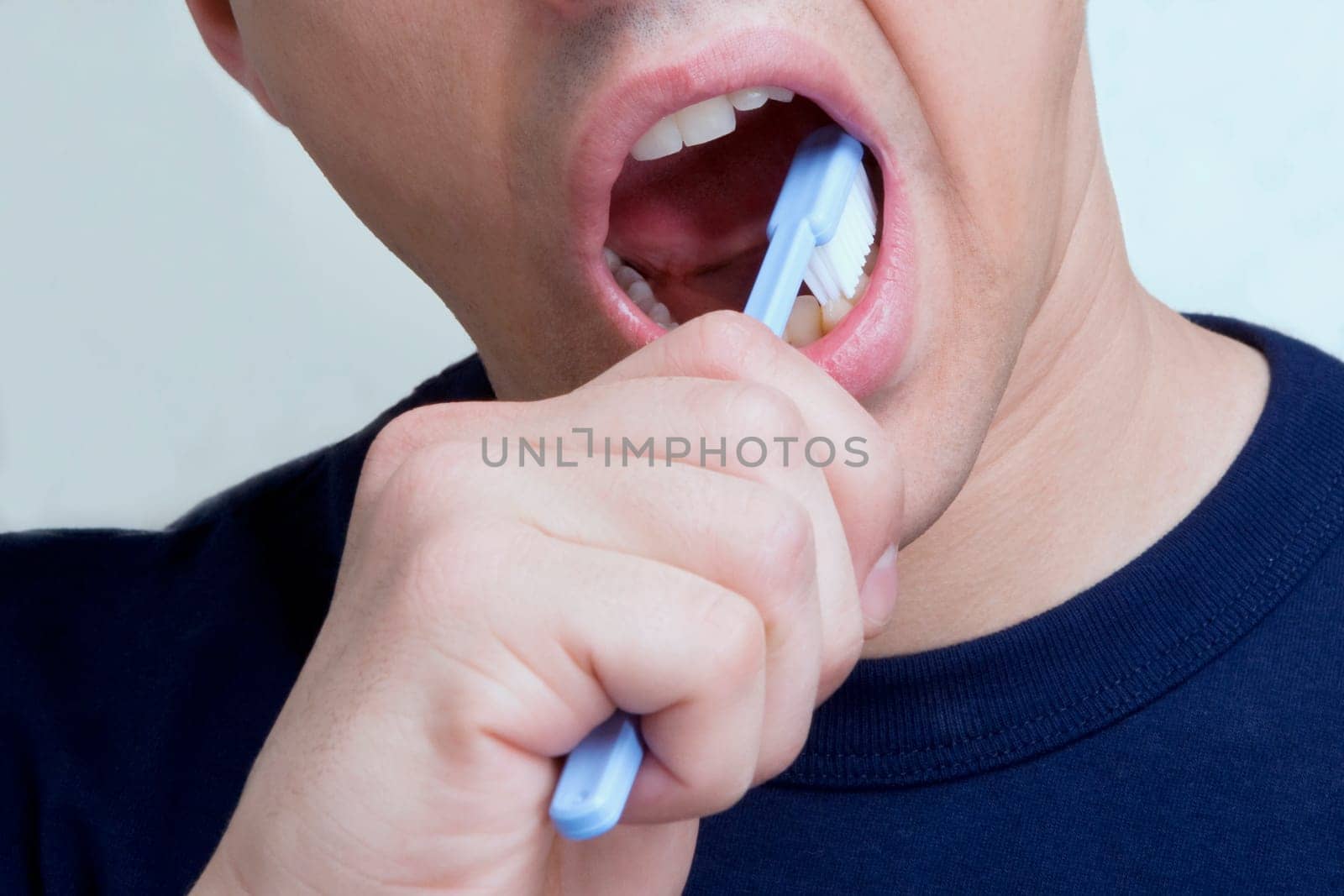 Man brushing teeth