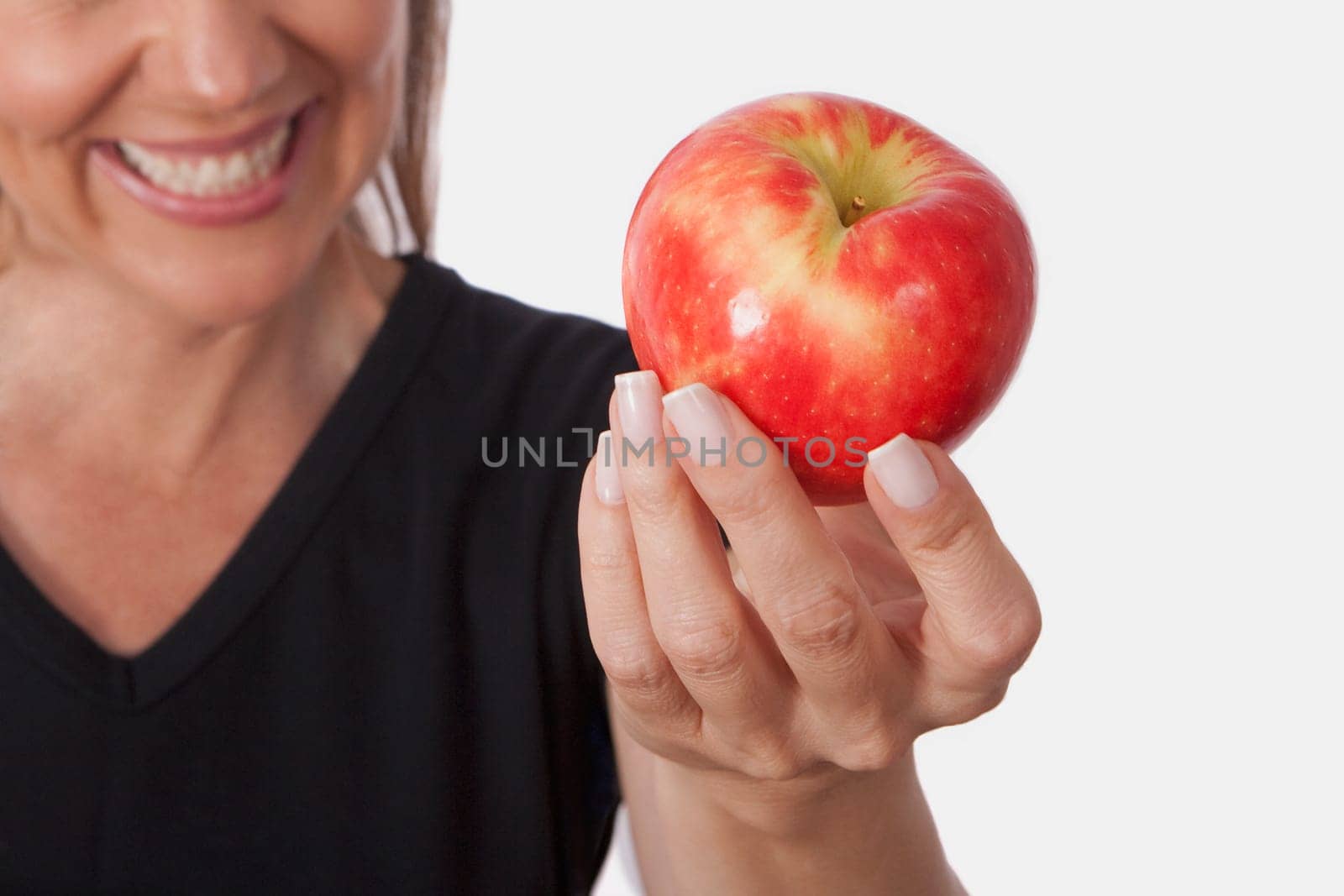 Woman holding an apple