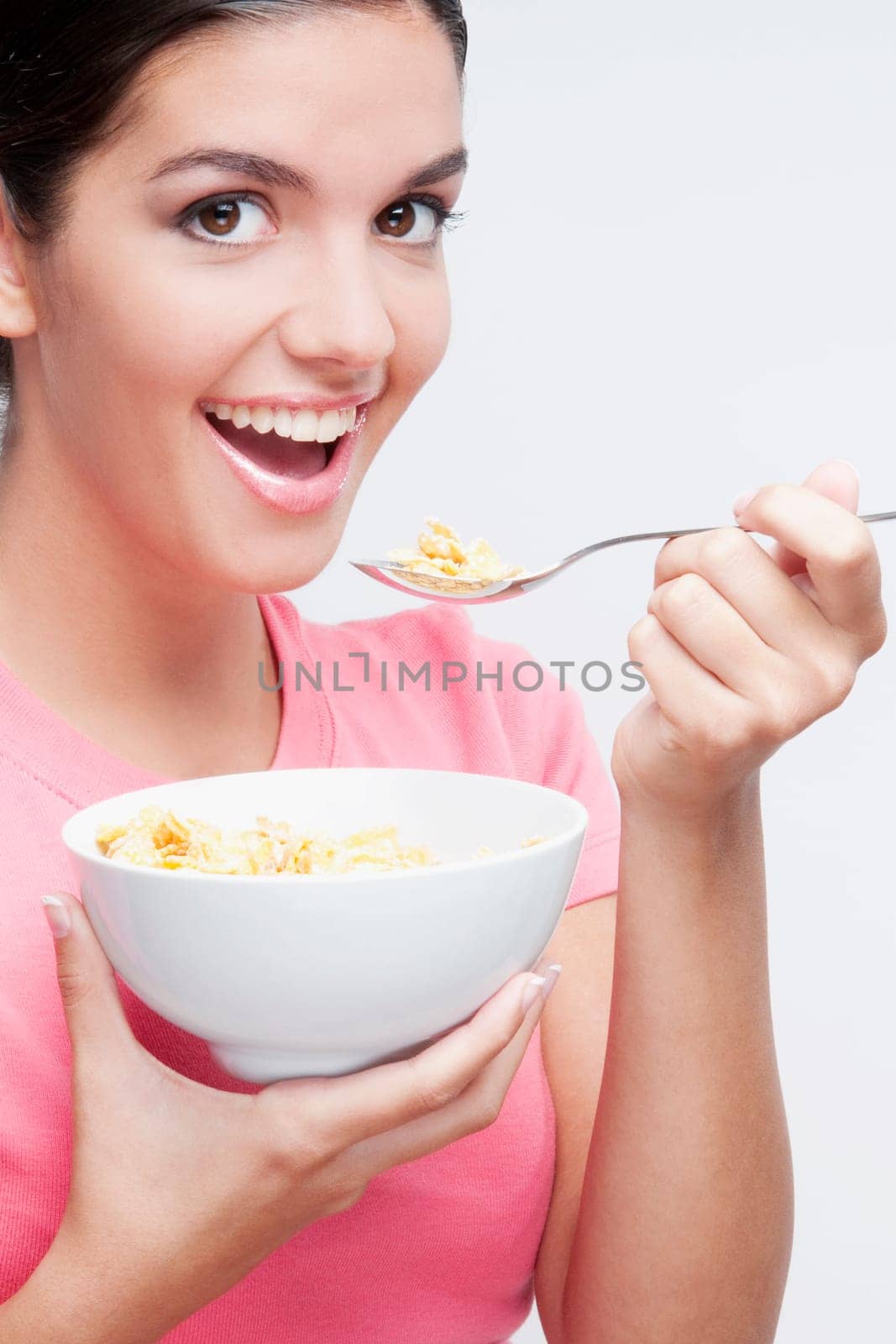 Portrait of a woman eating cereal
