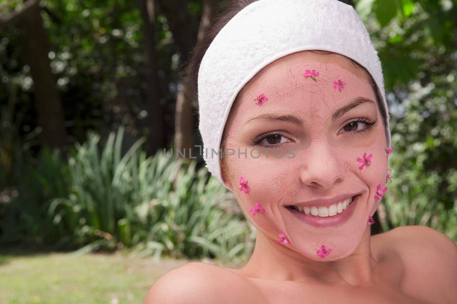 Woman receiving facial treatment