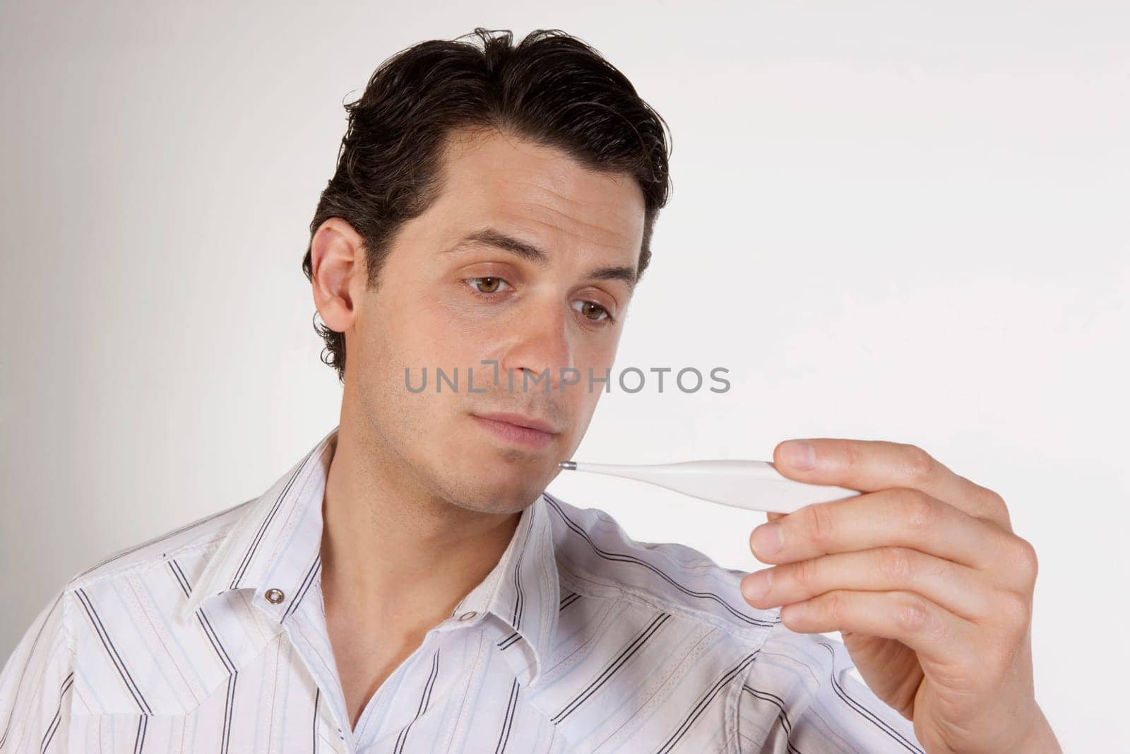 Man reading a thermometer