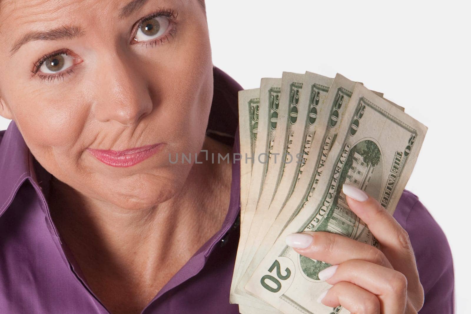 Woman holding currency notes