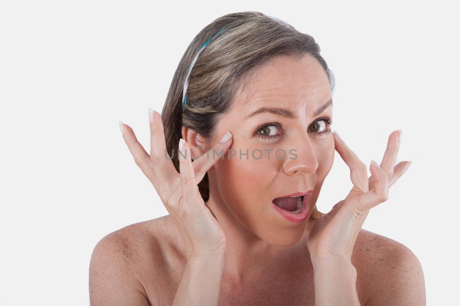 Woman touching her temples