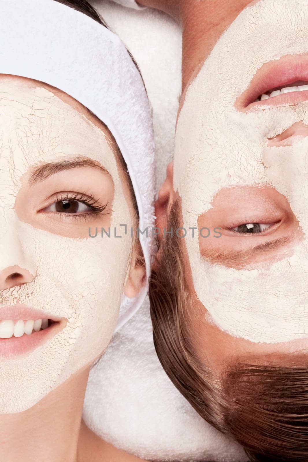 Couple with face pack on their faces